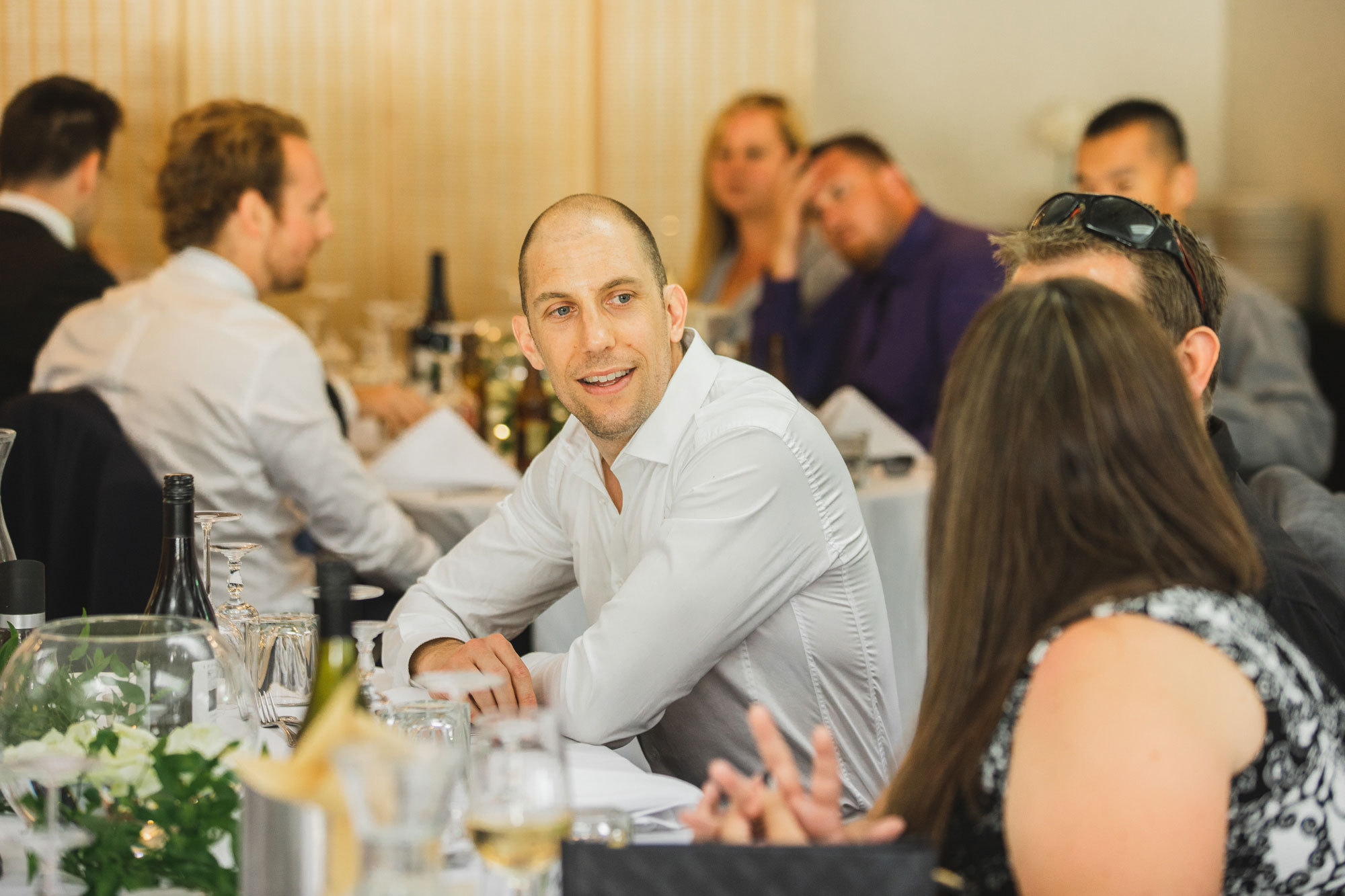 wedding reception guests talking