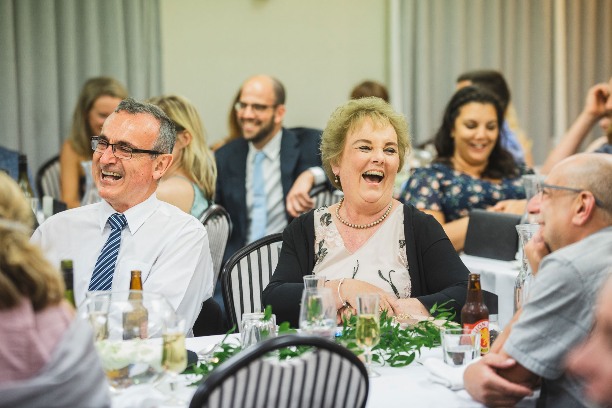 castaways wedding guests laughing