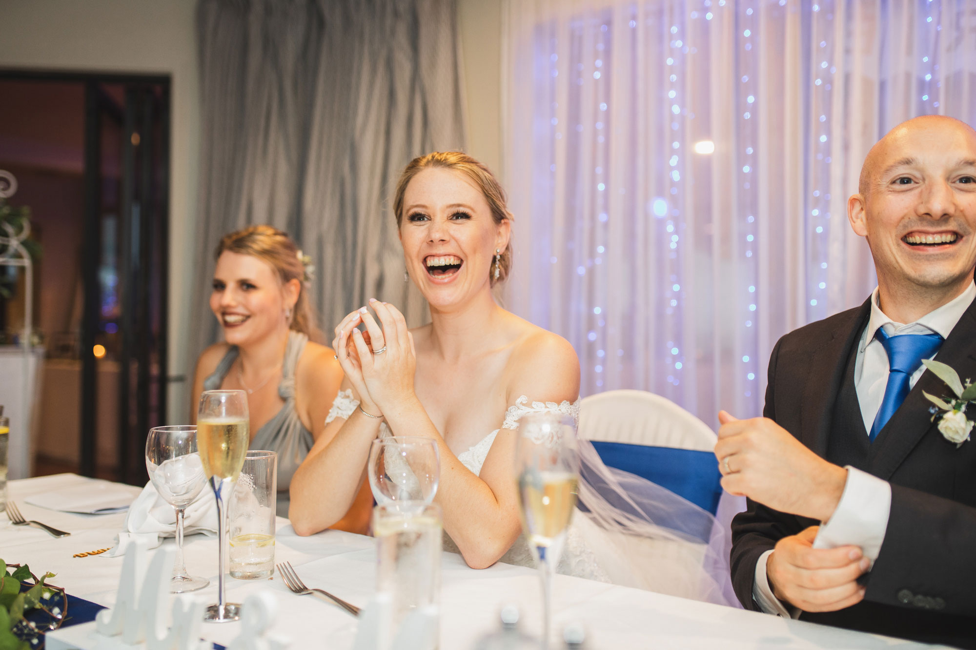 castaways wedding reception bride laughing