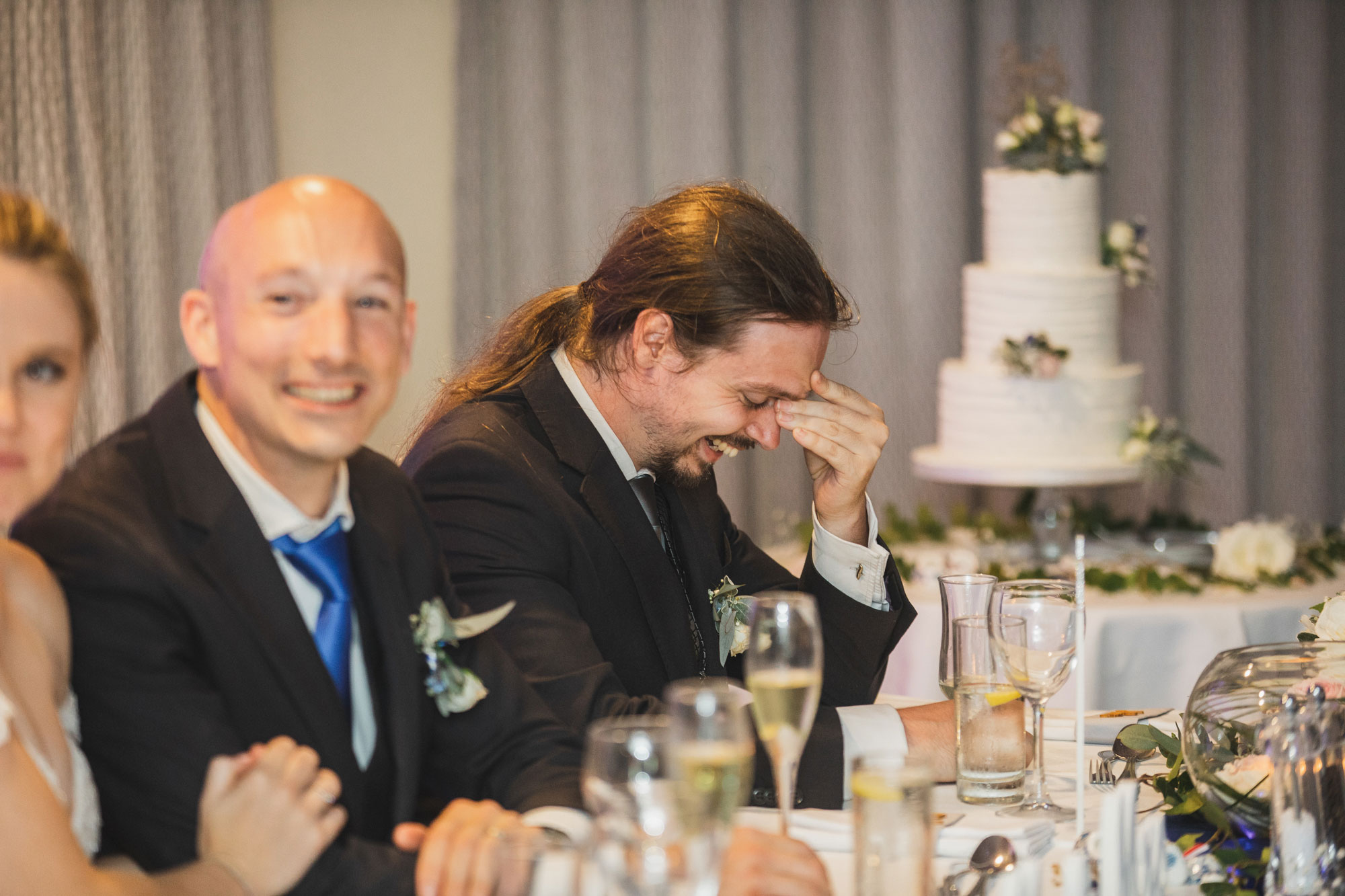 auckland wedding groomsman laughing