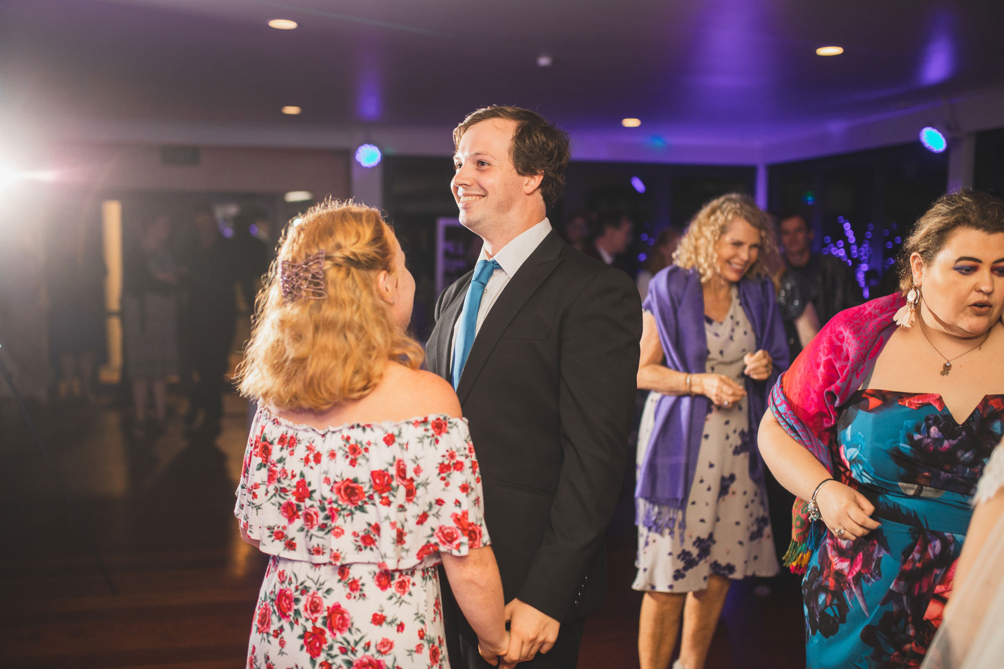 wedding guests having a good time