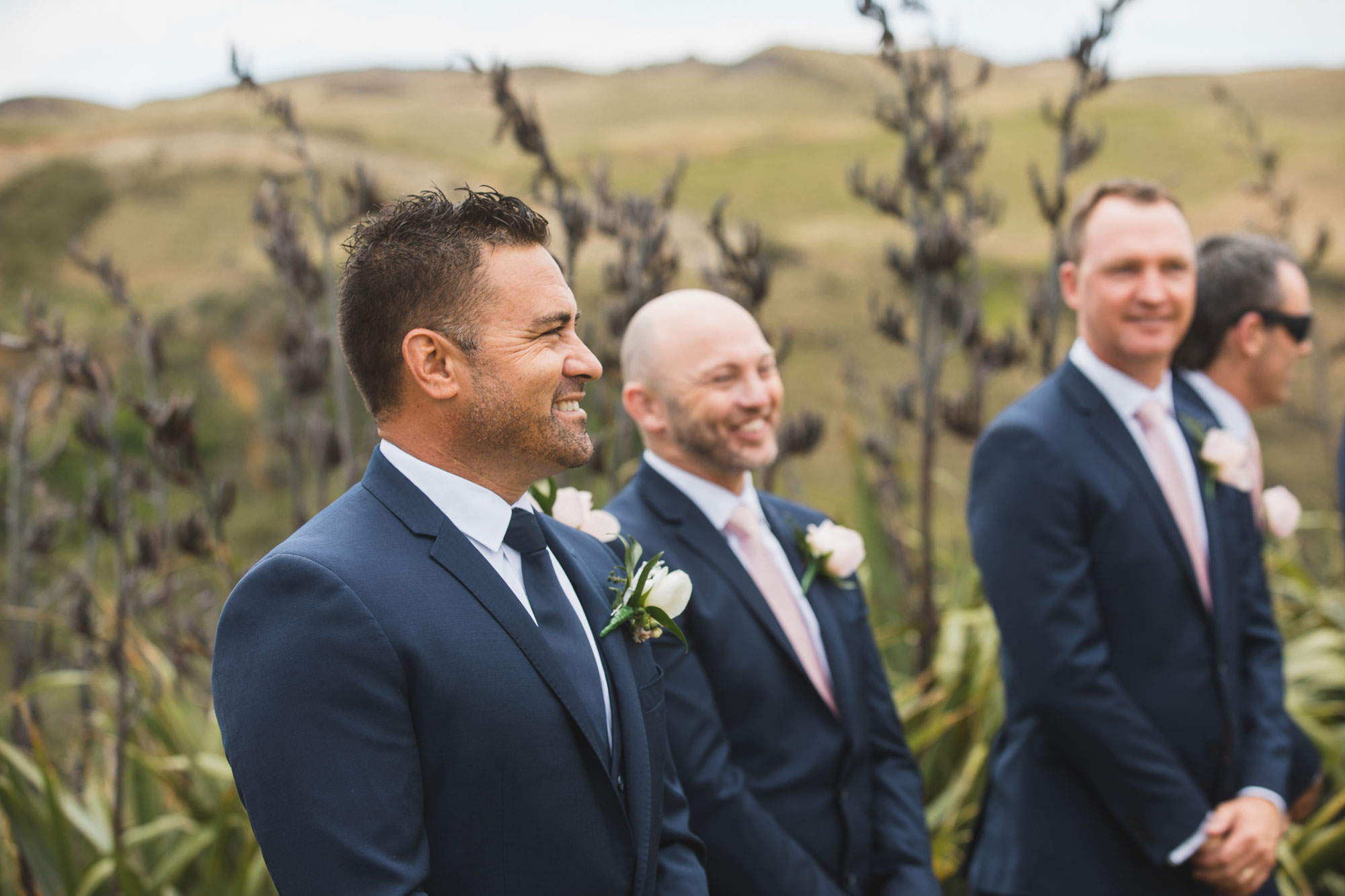 auckland castaways wedding groom laughing