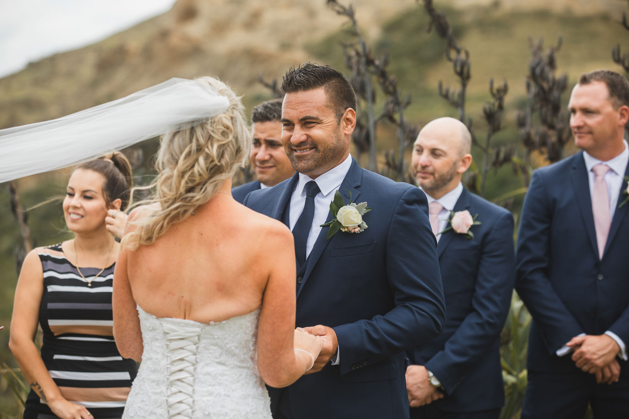 auckland castaways wedding groom smiling