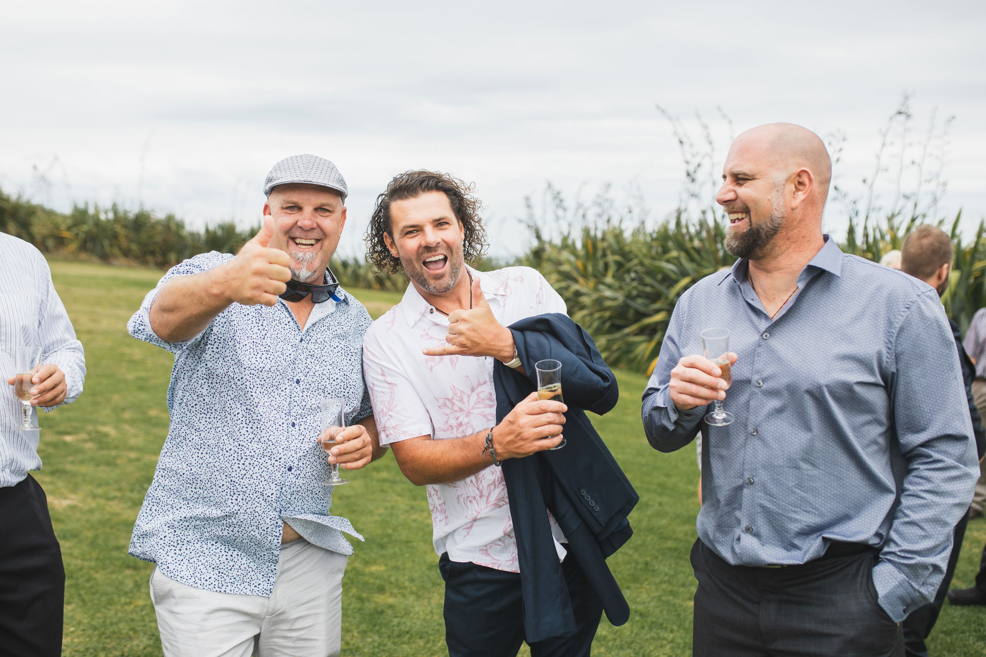 auckland castaways wedding friends having a laugh