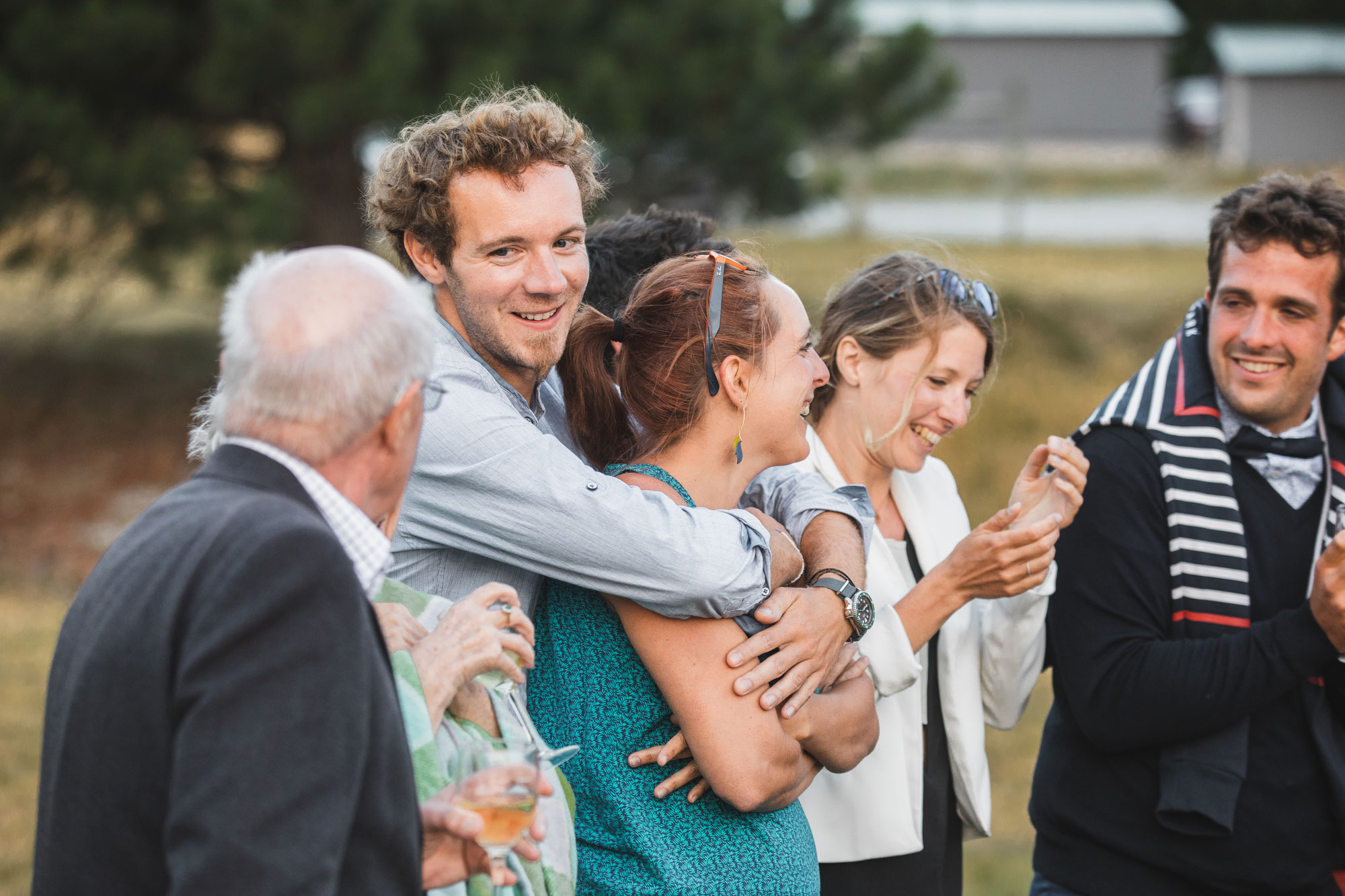 christchurch wedding guests hugging