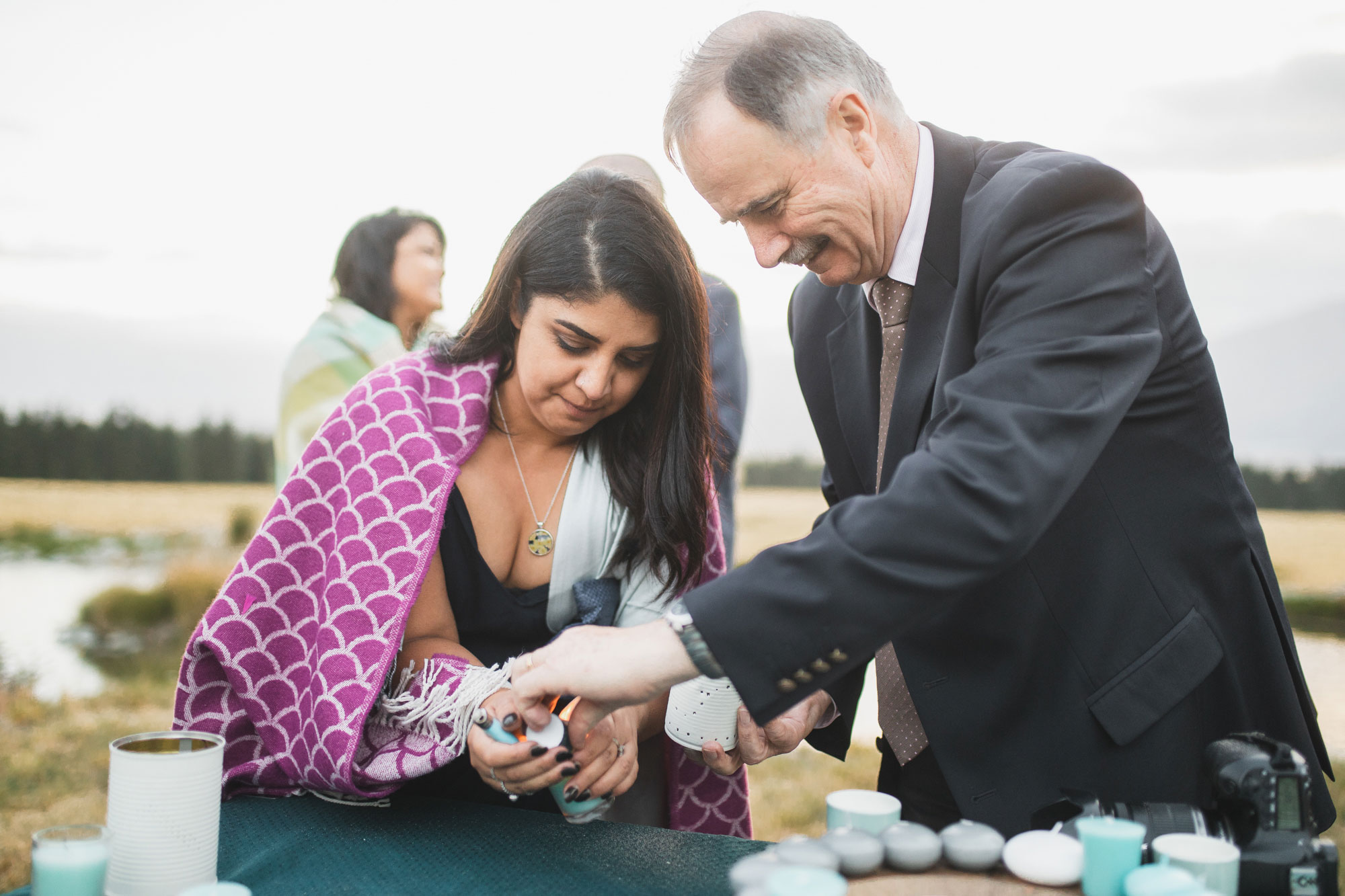 christchurch wedding guests lighting candles