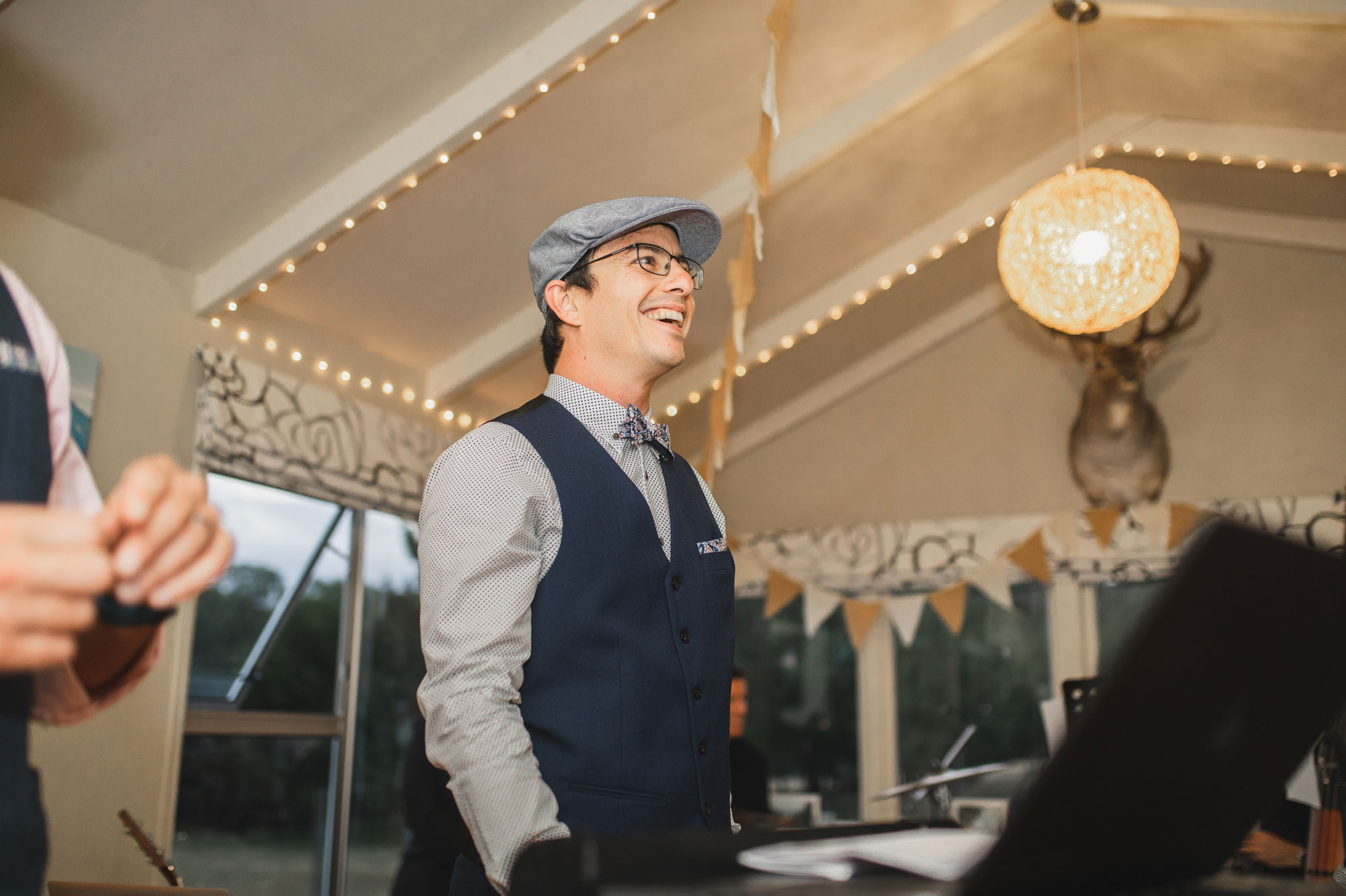 christchurch wedding groomsman laughing