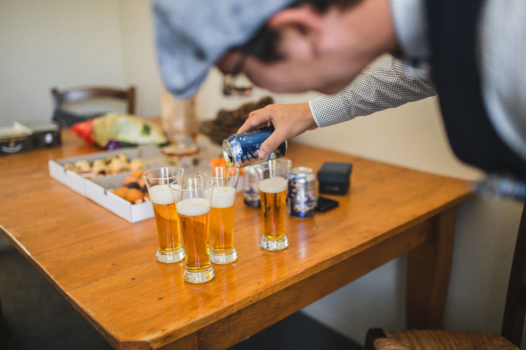 groomsmen getting drinks