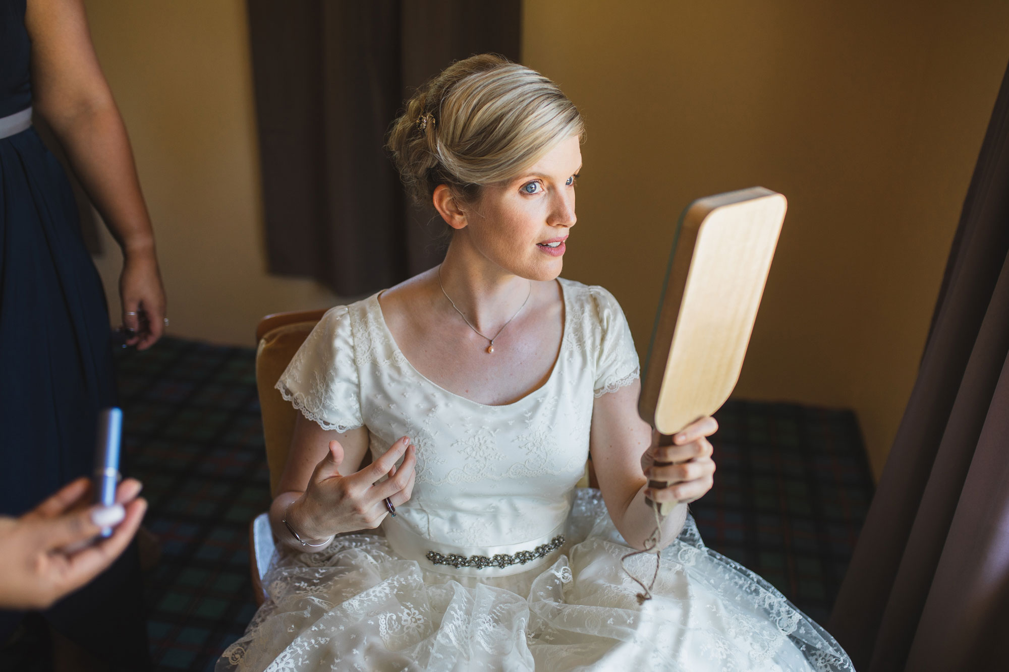 christchurch wedding bride looking at mirror