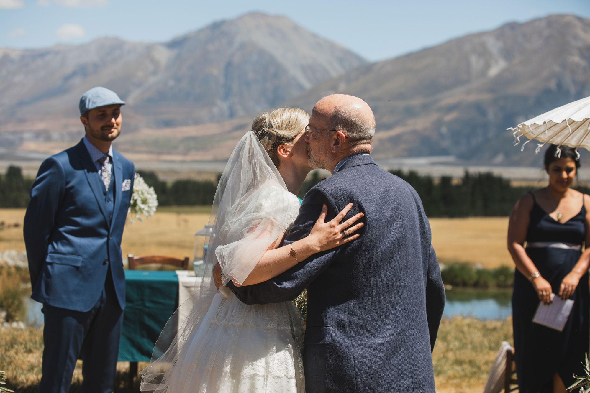 christchurch wedding bride and father hug