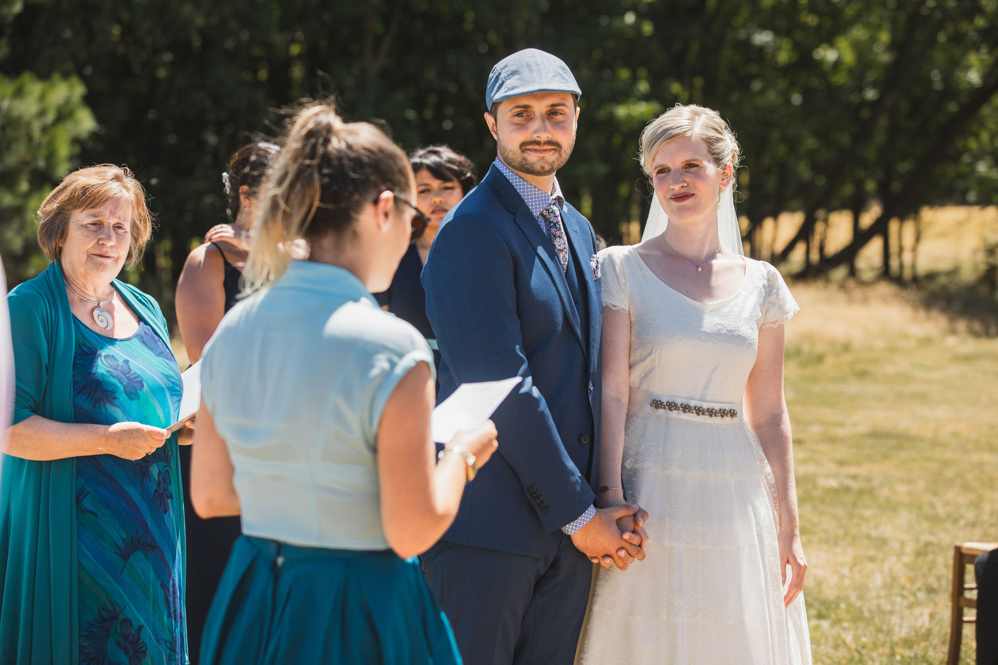 christchurch wedding bride and groom listening to speech