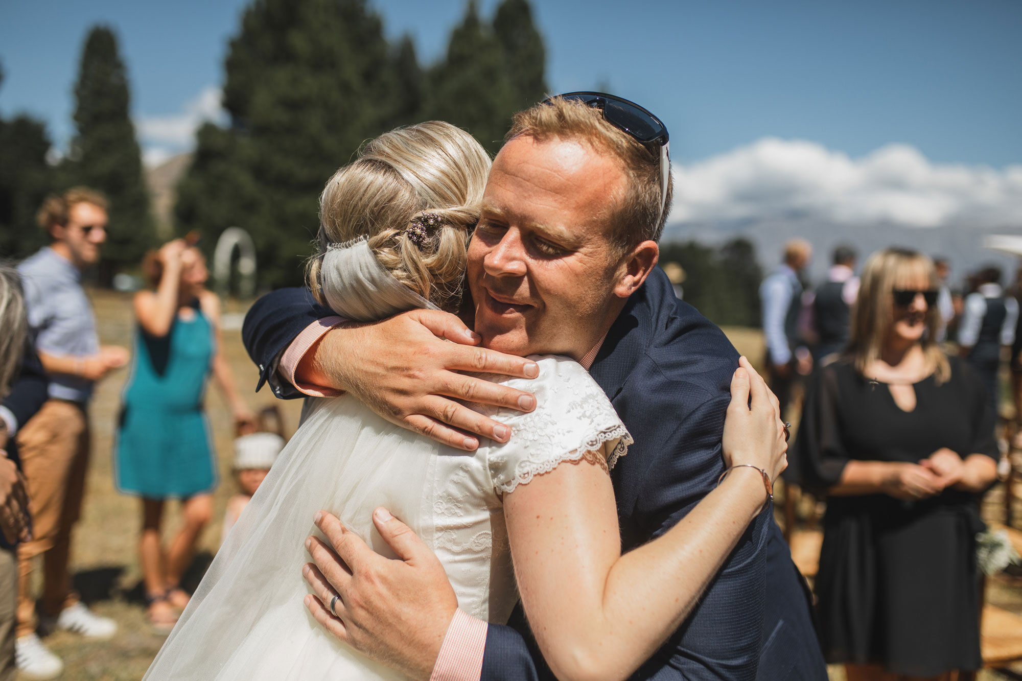 mt. potts lodge wedding bride hugging friend