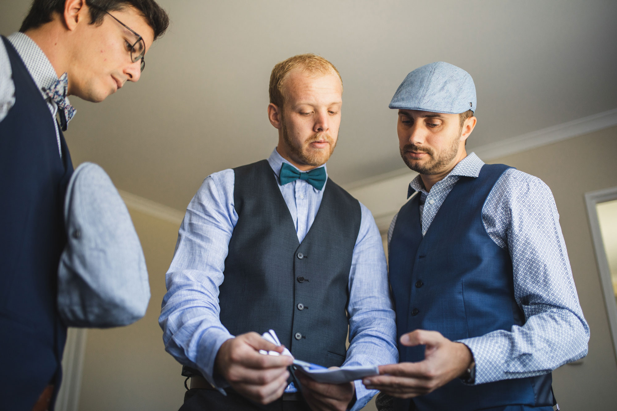 christchurch wedding groomsmen talking