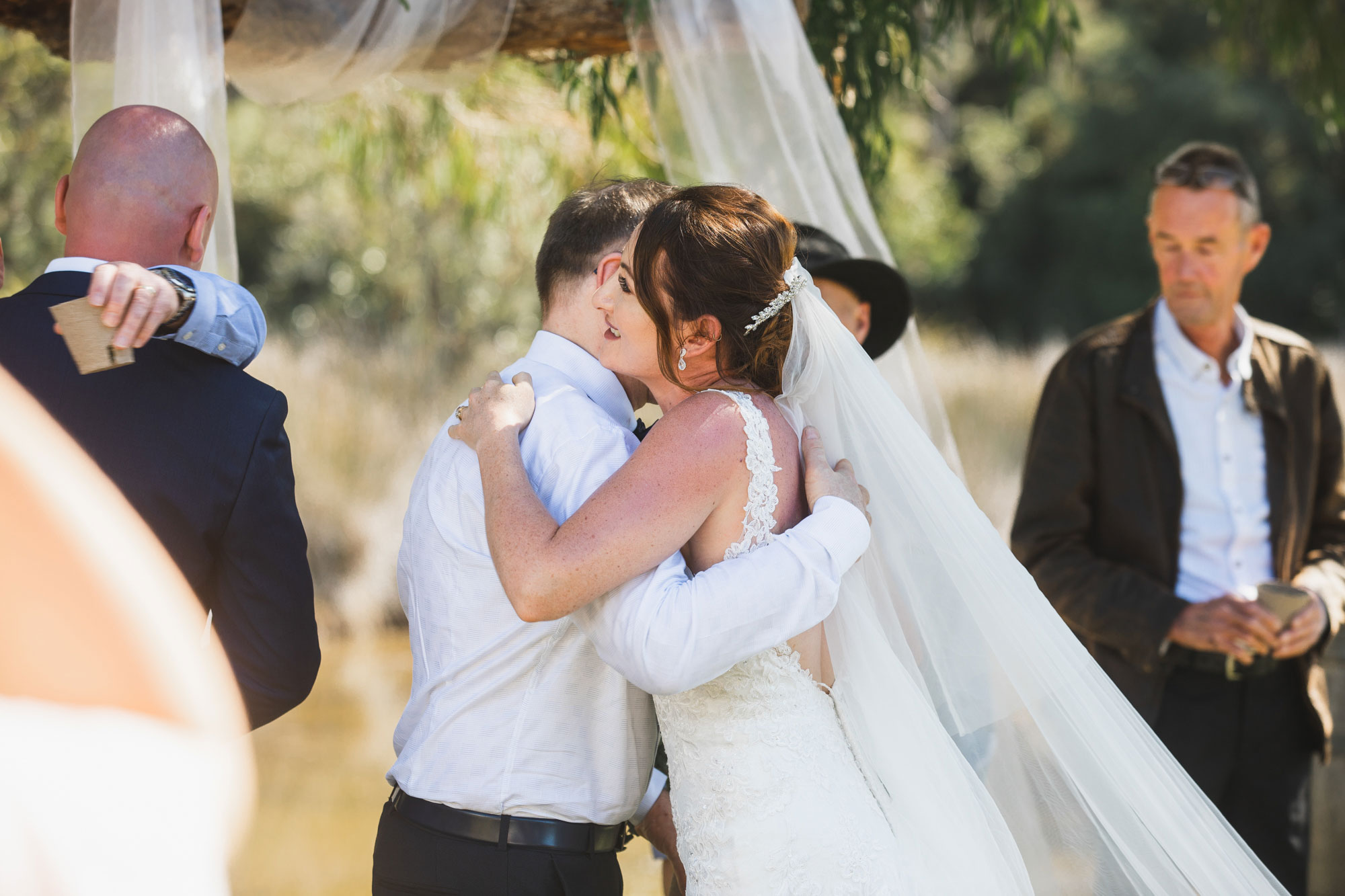 auckland tawharanui lodge wedding bride hugging father