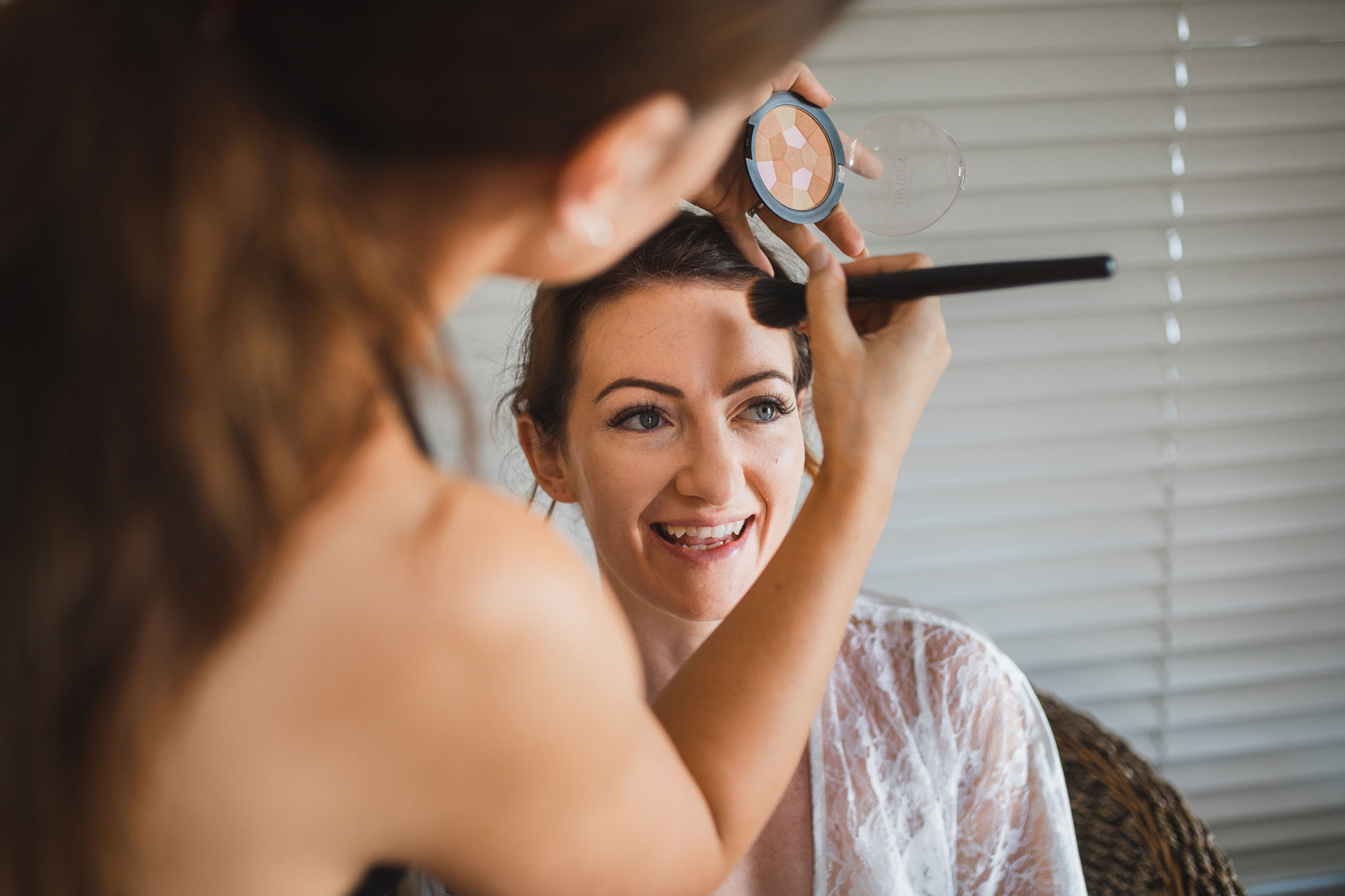 auckland wedding bride getting make up