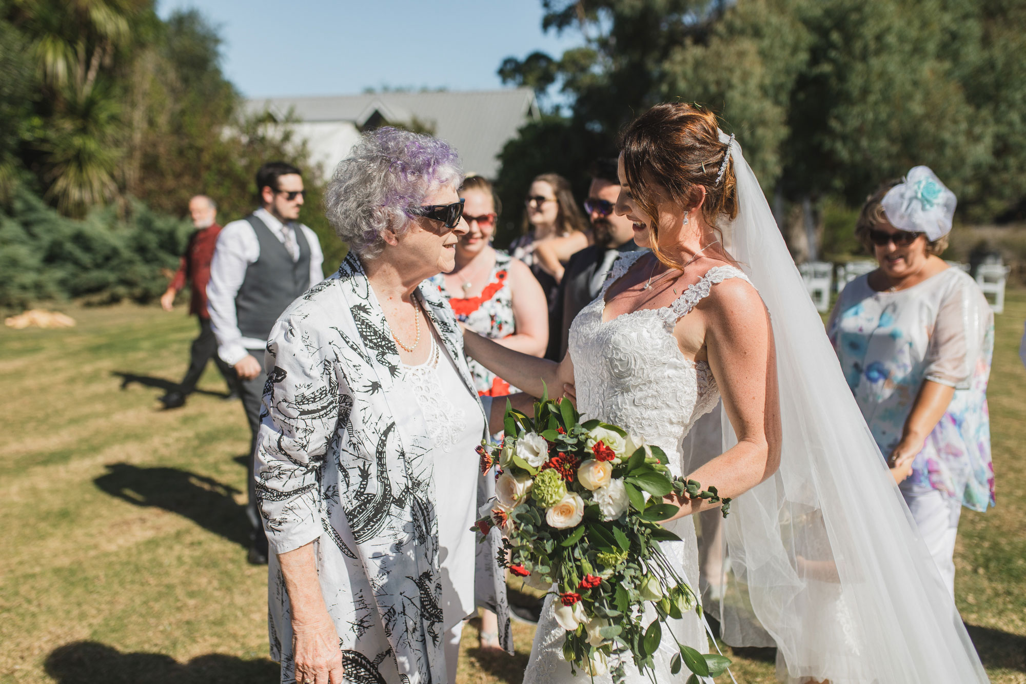 auckland tawharanui lodge wedding guests congratulating