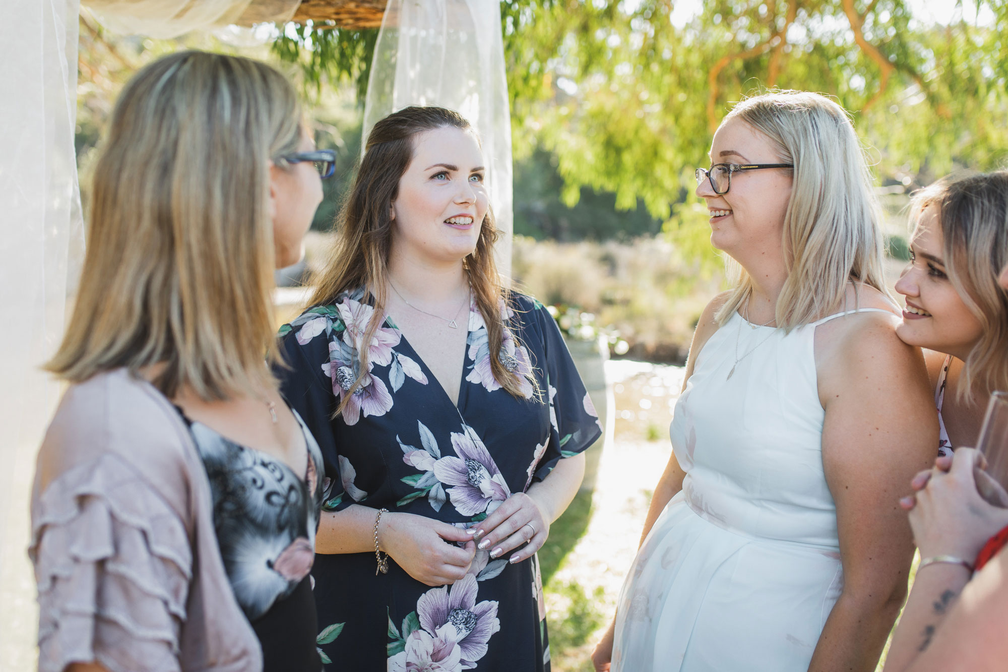 auckland tawharanui lodge wedding guests chatting