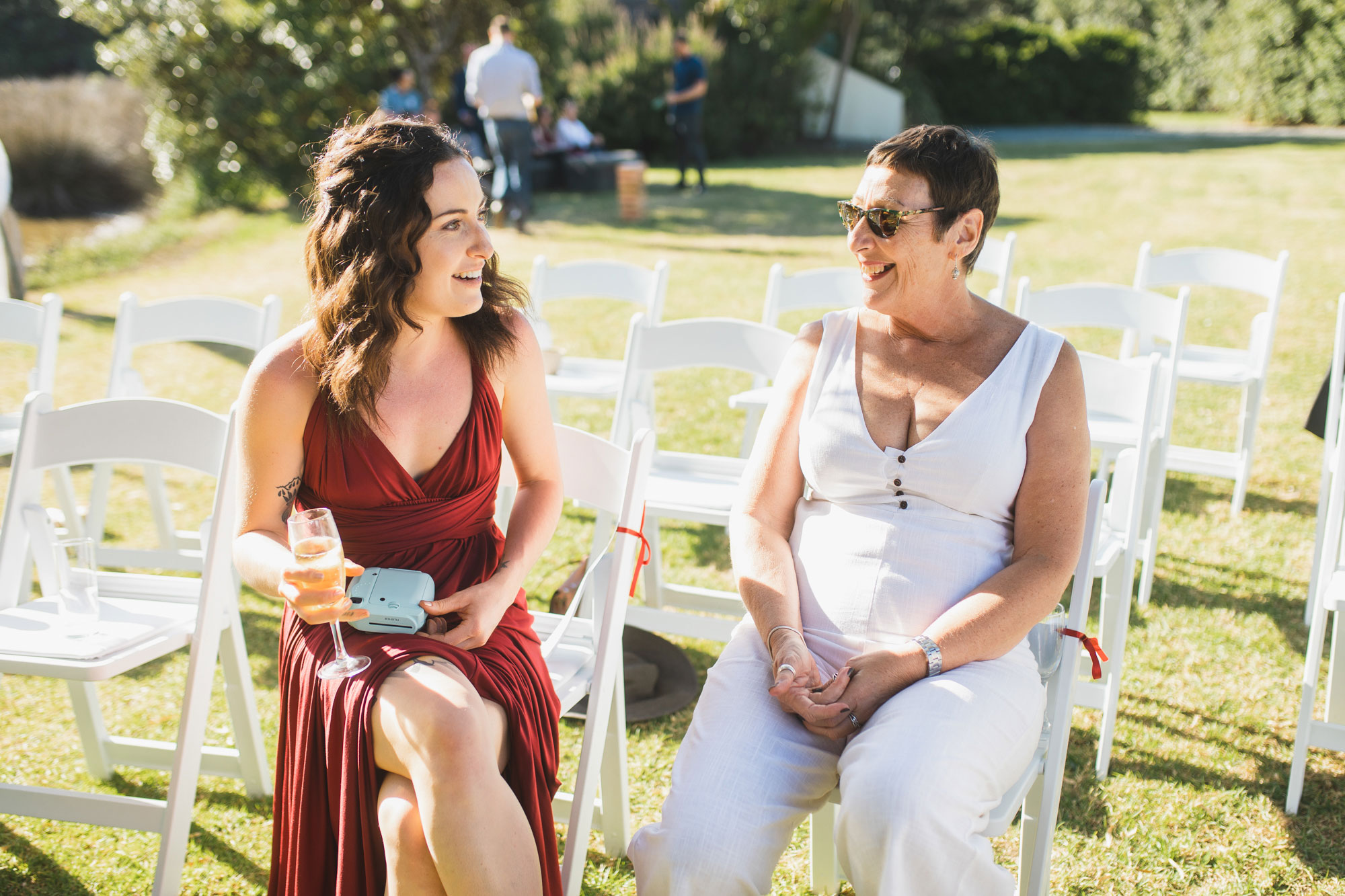 auckland tawharanui lodge wedding guests talking