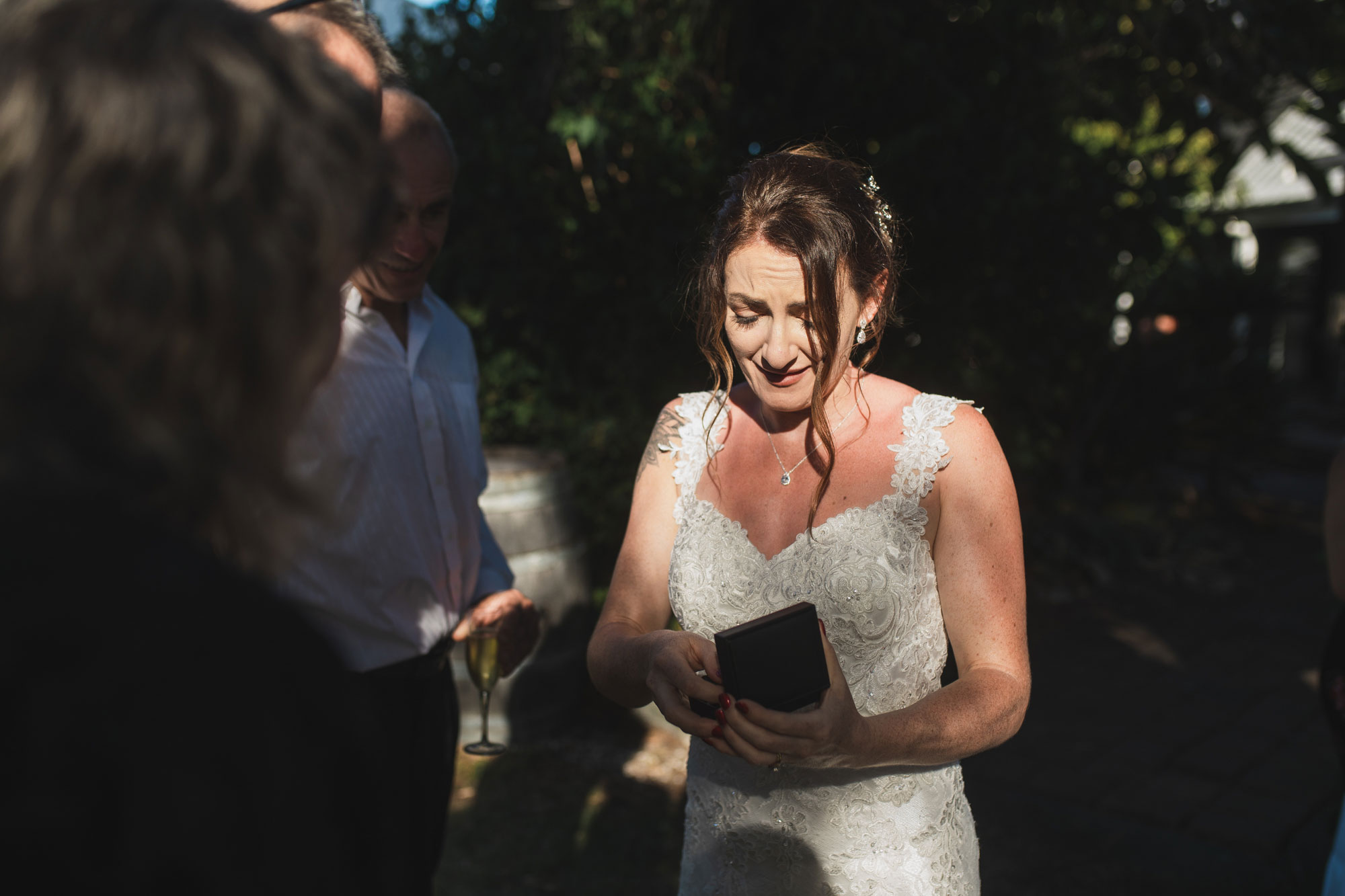 auckland tawharanui lodge wedding bride receiving gift