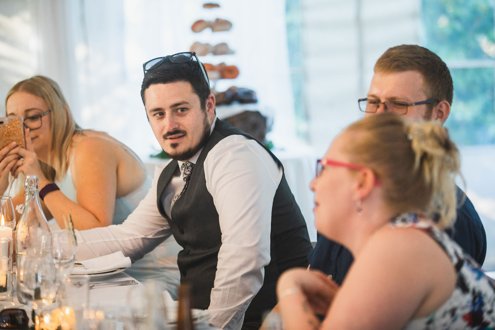 auckland tawharanui lodge wedding guests at reception