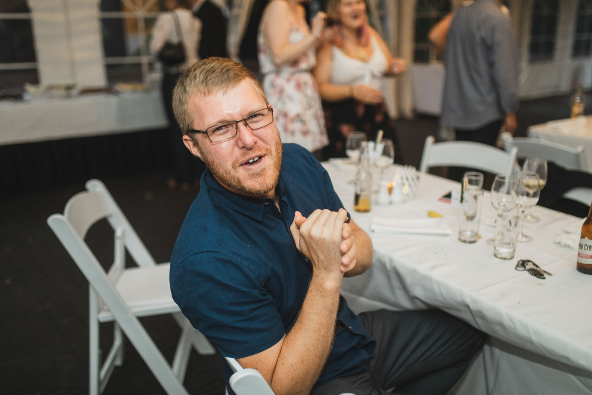 auckland tawharanui lodge wedding guest looking at camera