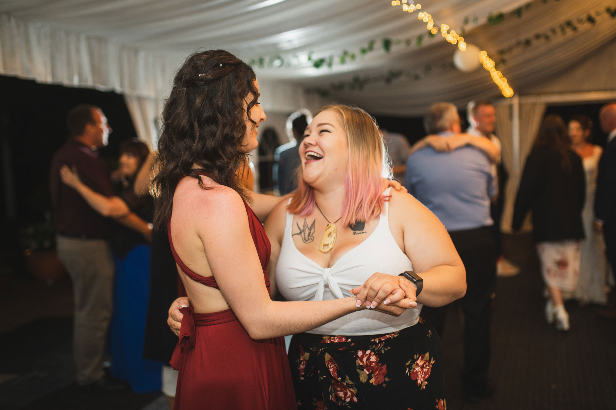 auckland tawharanui lodge wedding guests having a great time