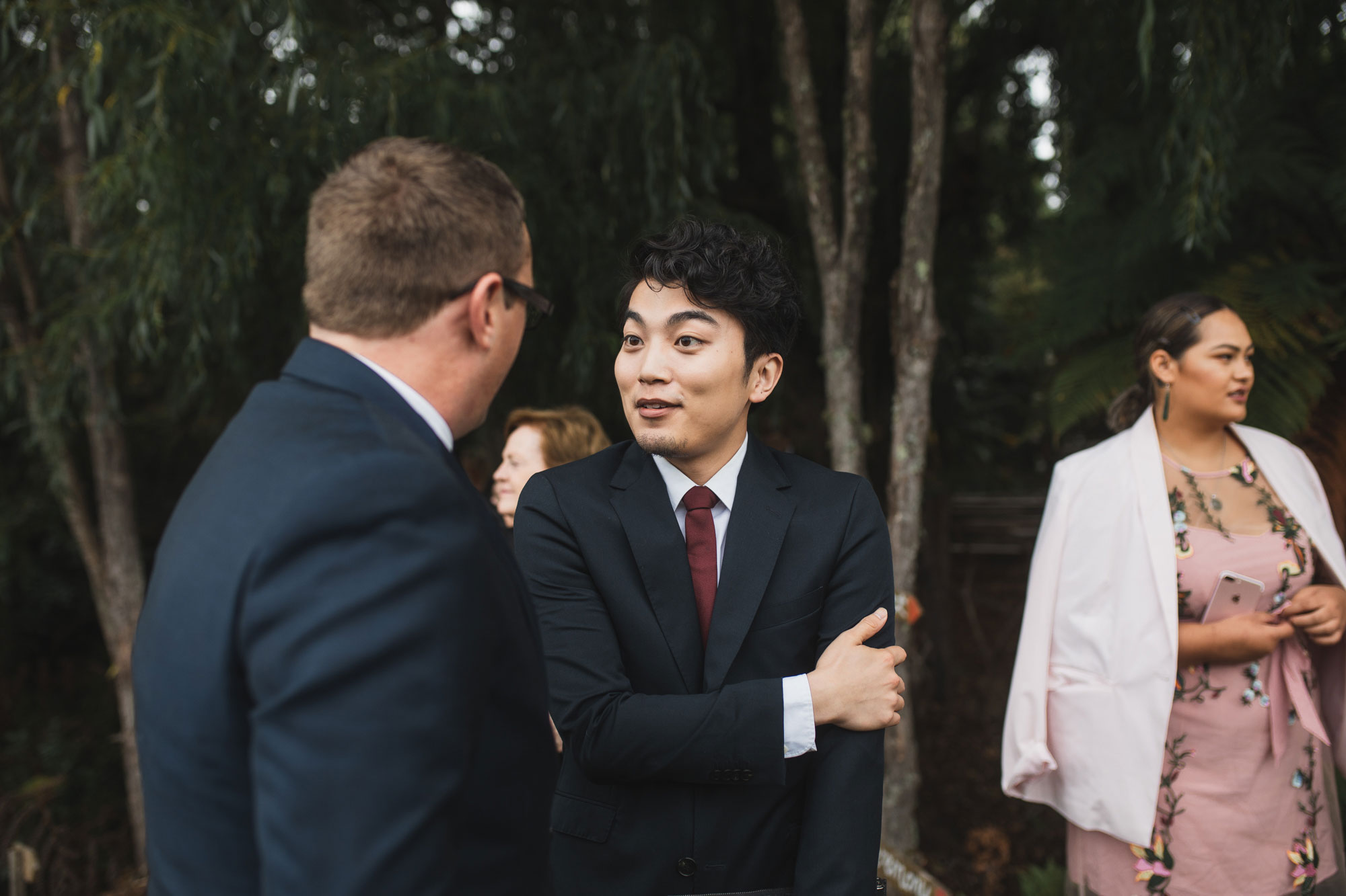 auckland waterfall farm wedding guest and groom