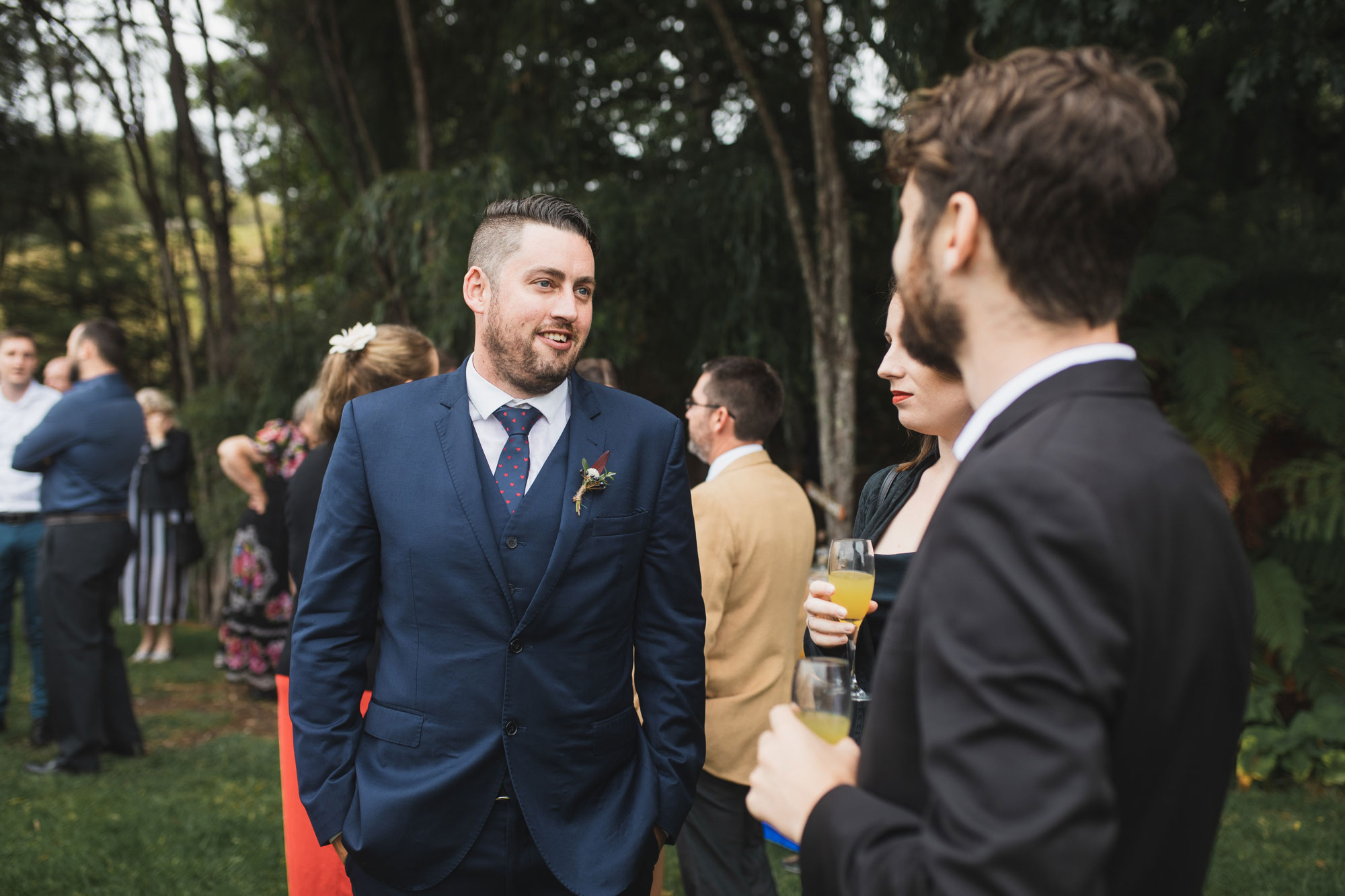 auckland waterfall farm wedding guest having a good time