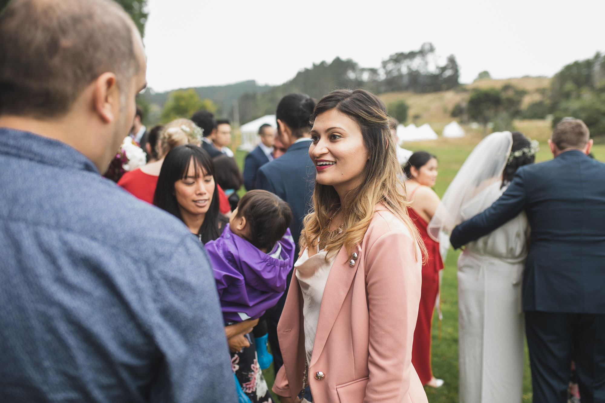 auckland waterfall farm wedding guest candid photo