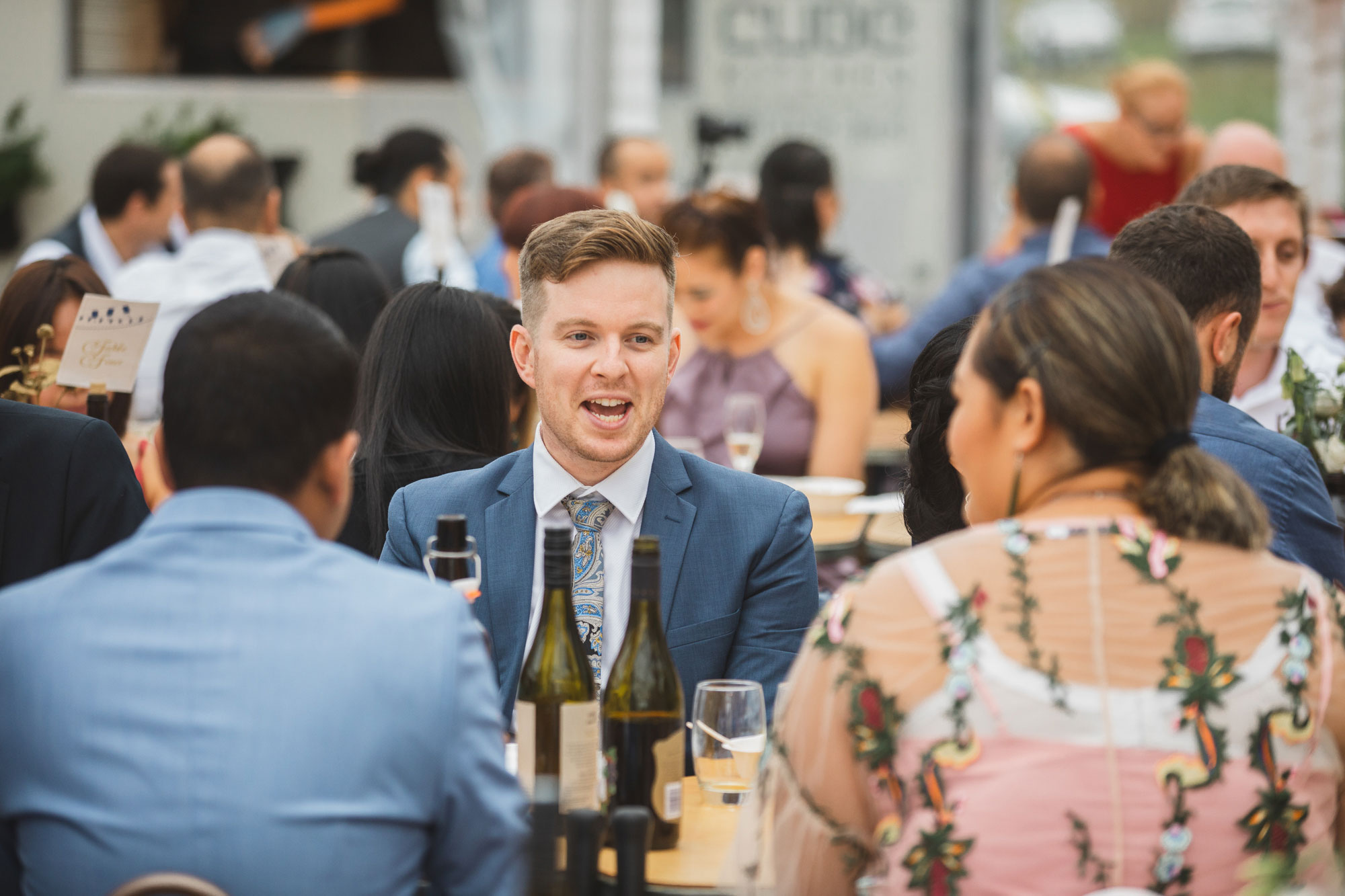 wedding guests chatting