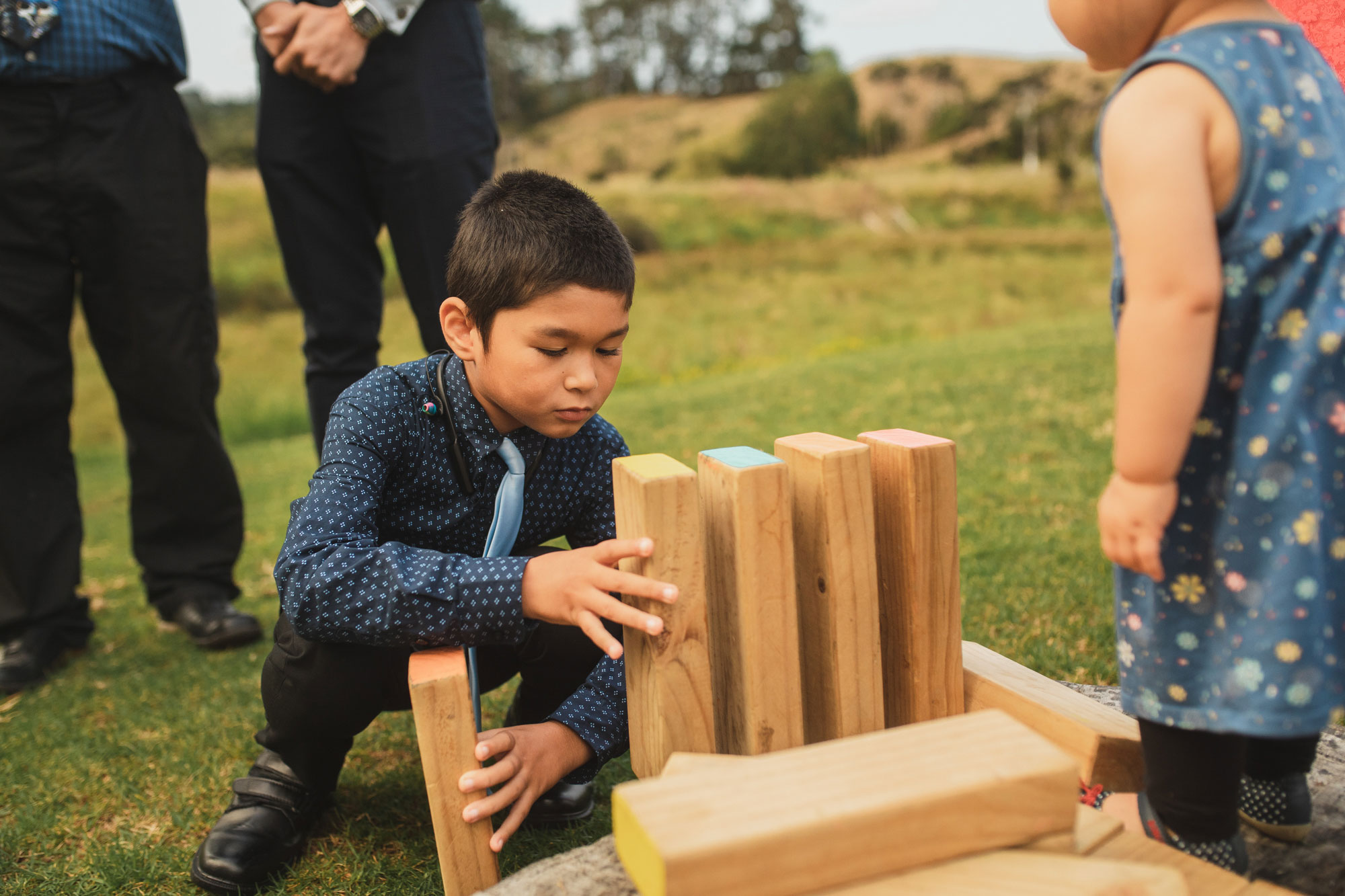 auckland wedding boy playing jenga