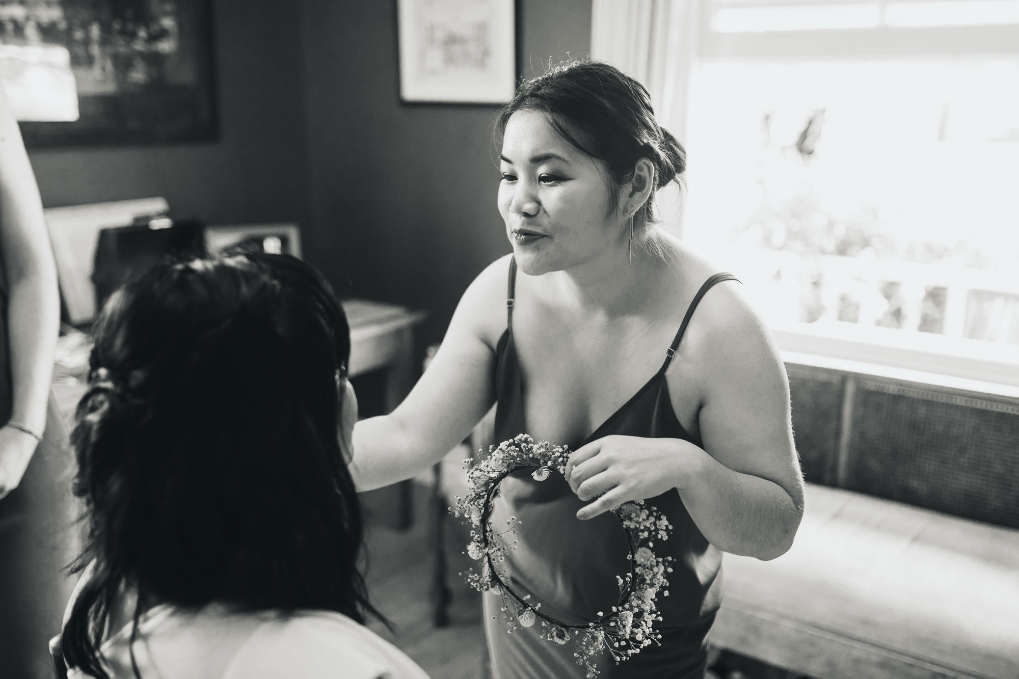 auckland wedding bridesmaid doing make up