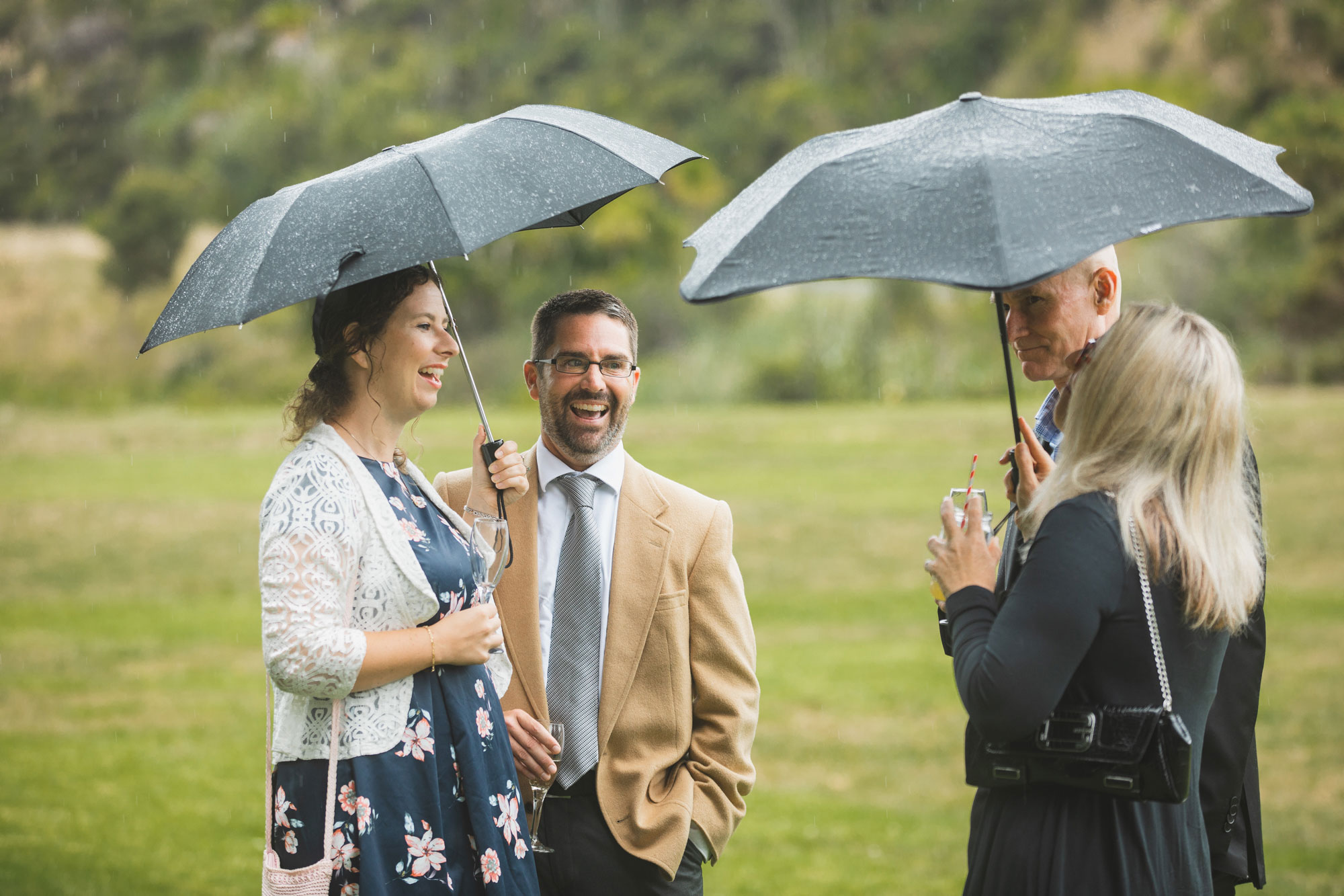 auckland waterfall farm wedding guests umbrella