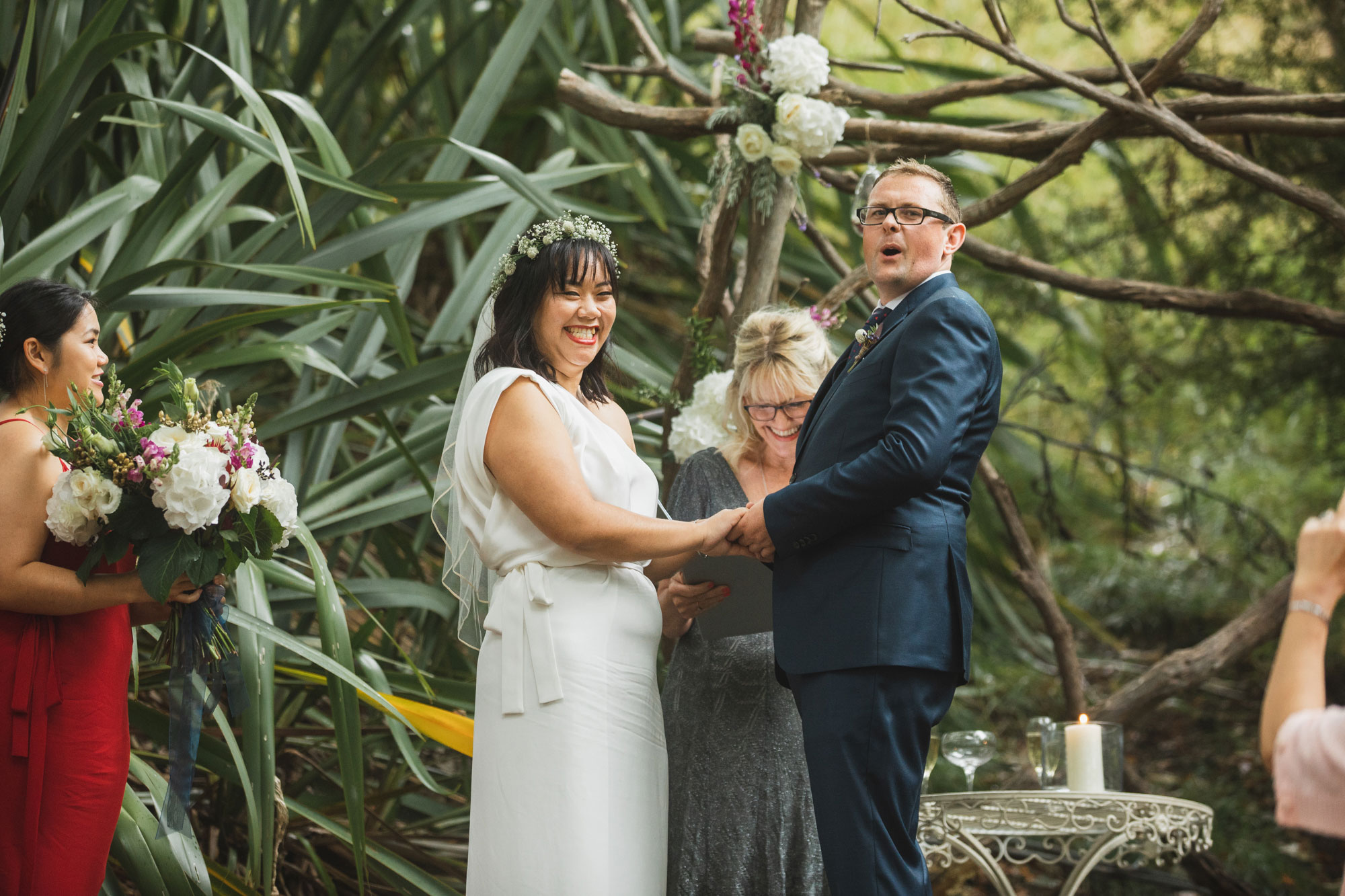 auckland waterfall farm wedding bride and groom react