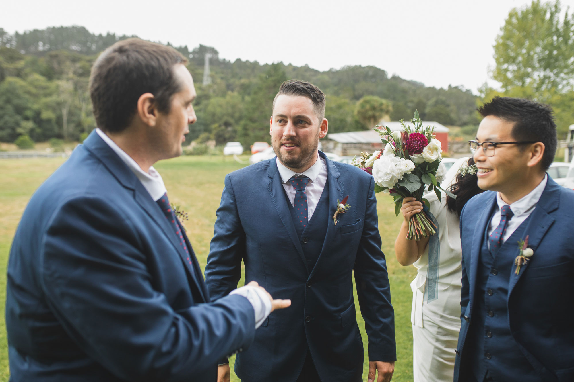 auckland waterfall farm wedding guests chatting