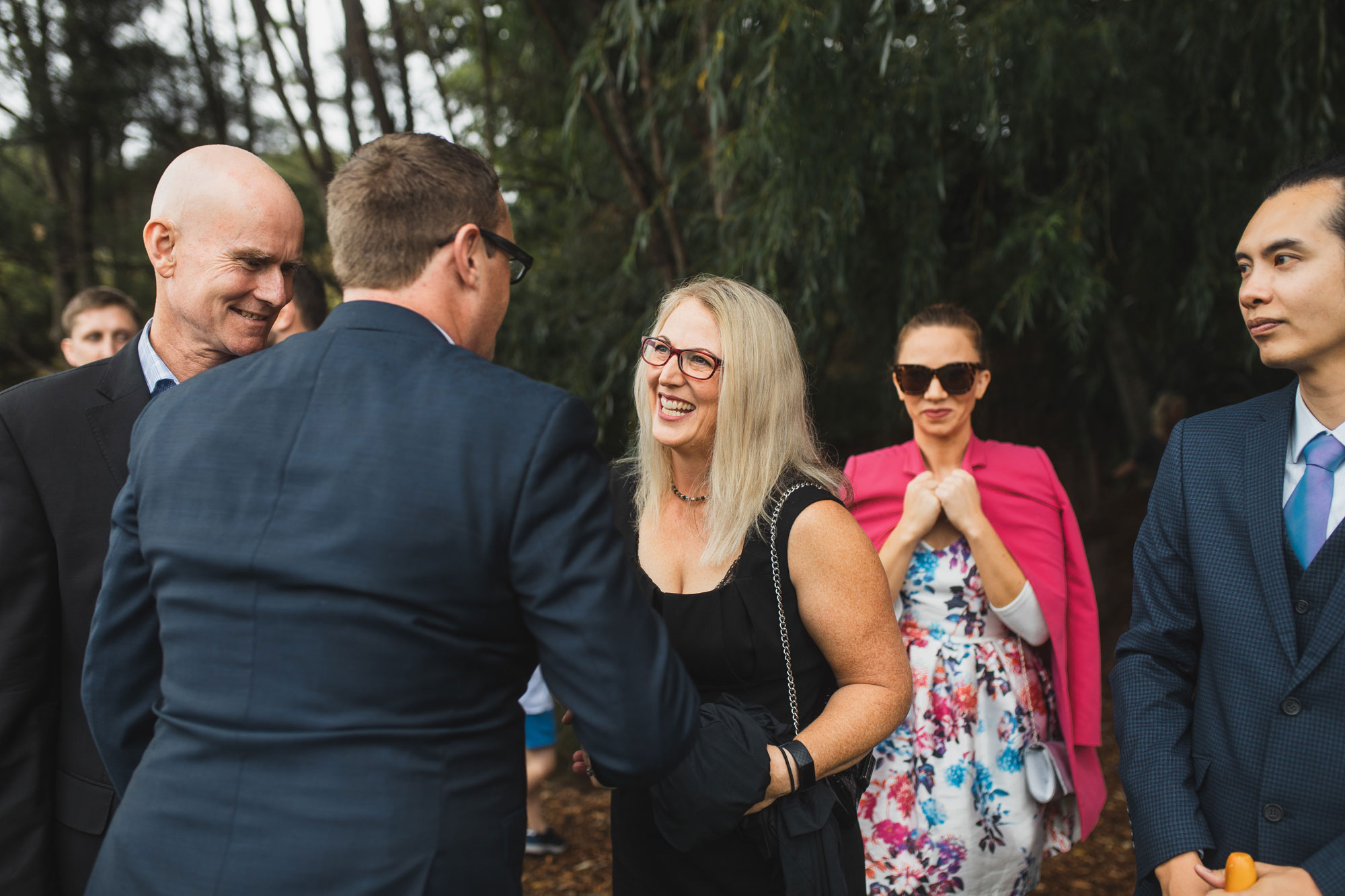 auckland waterfall farm wedding guests and groom