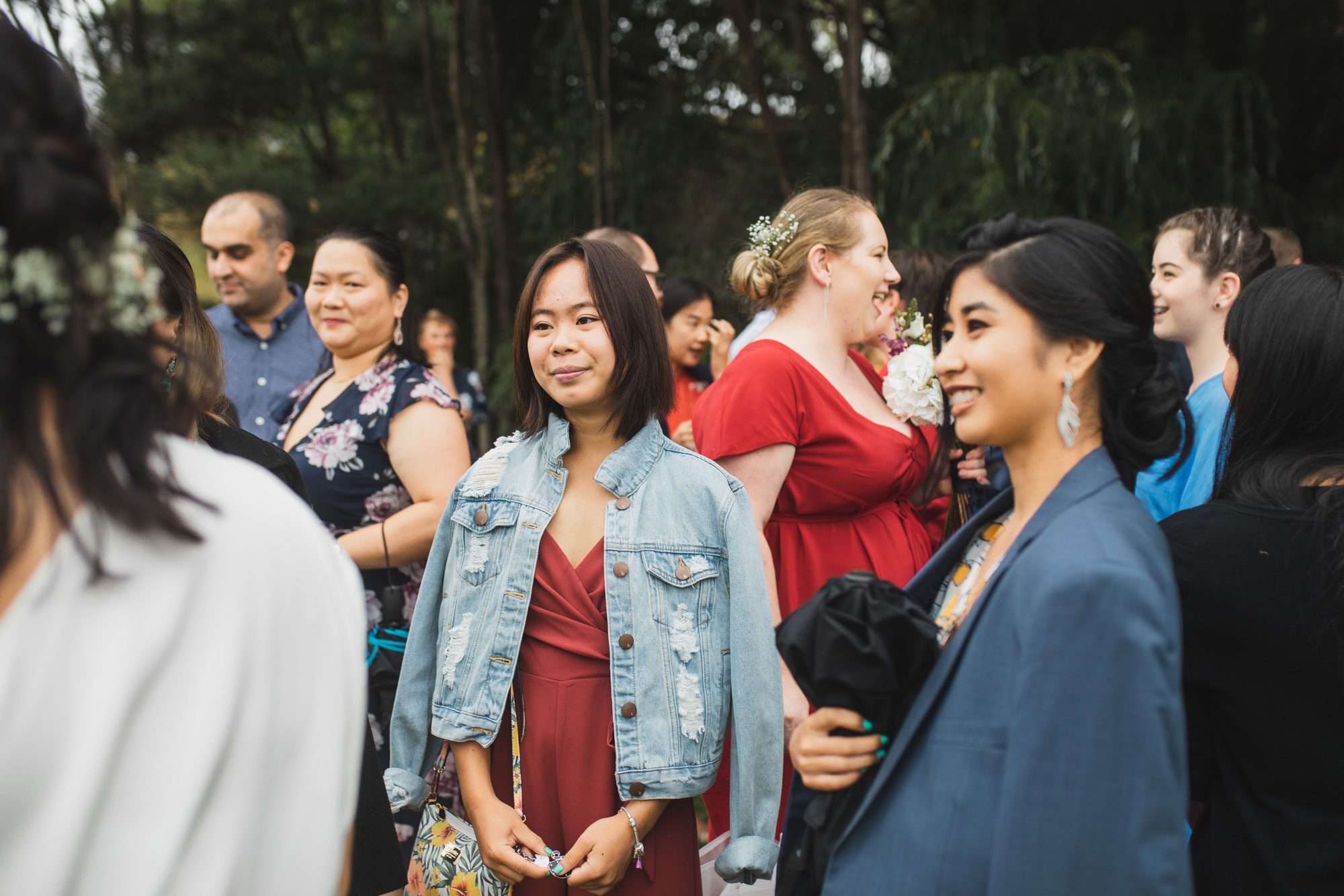 auckland waterfall farm wedding guests laughing