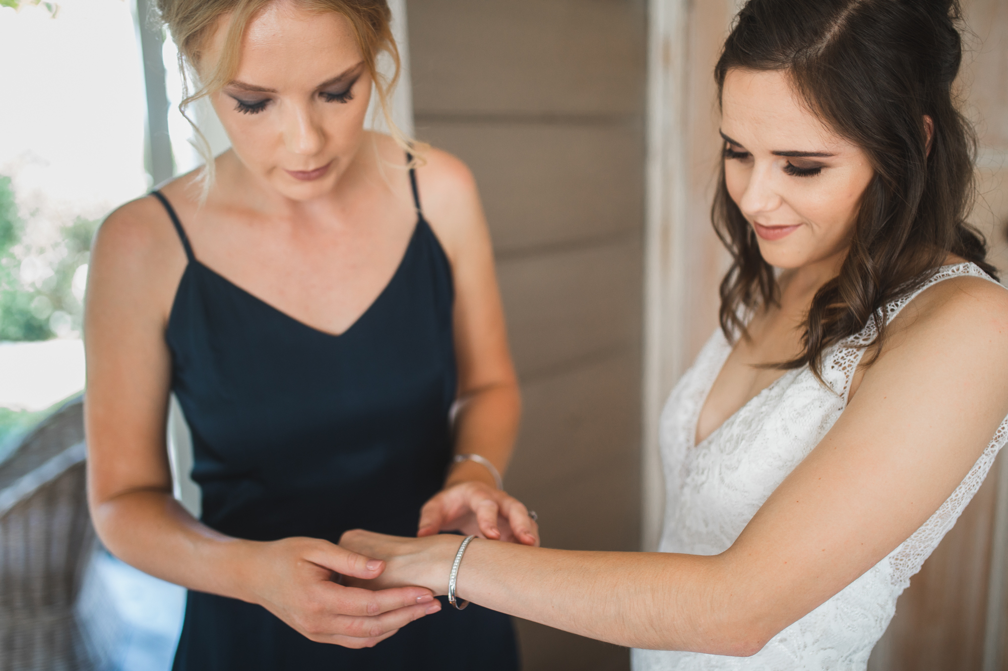 allely estate wedding putting on jewelry