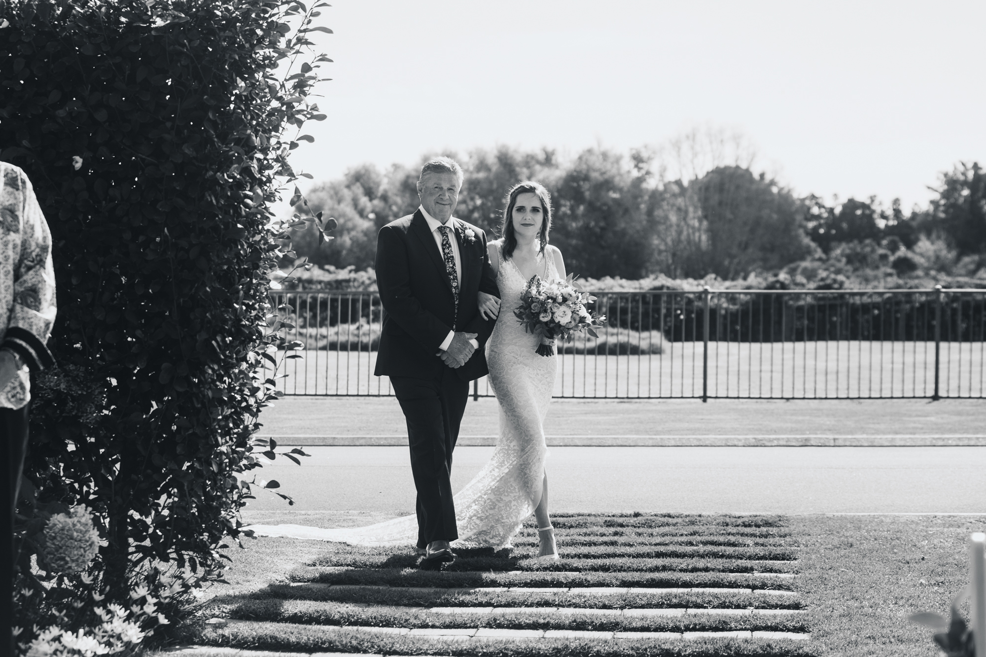 allely estate wedding bride walking down aisle