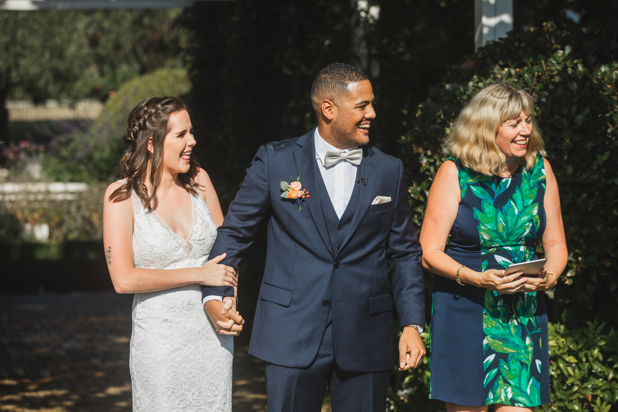 bride and groom laughing