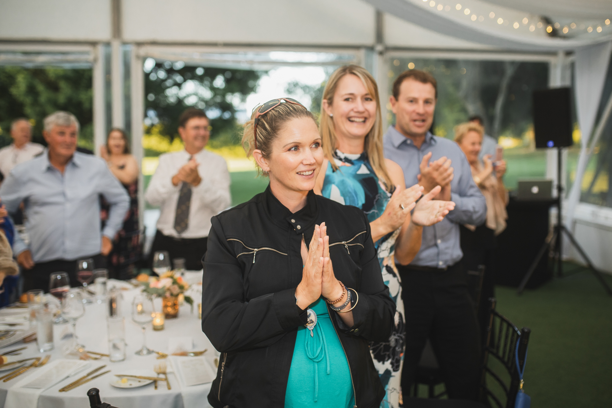 wedding guests clapping