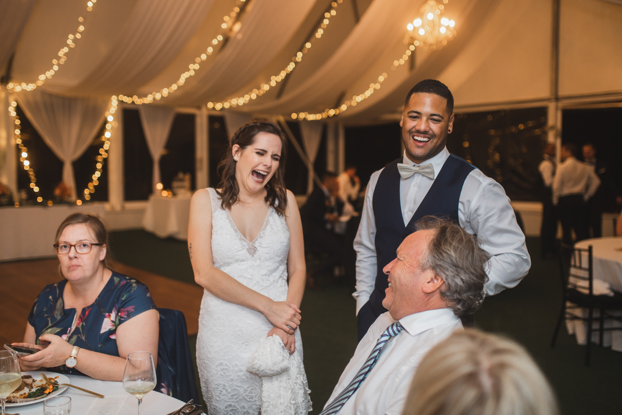 bride and groom laughing kumeu wedding