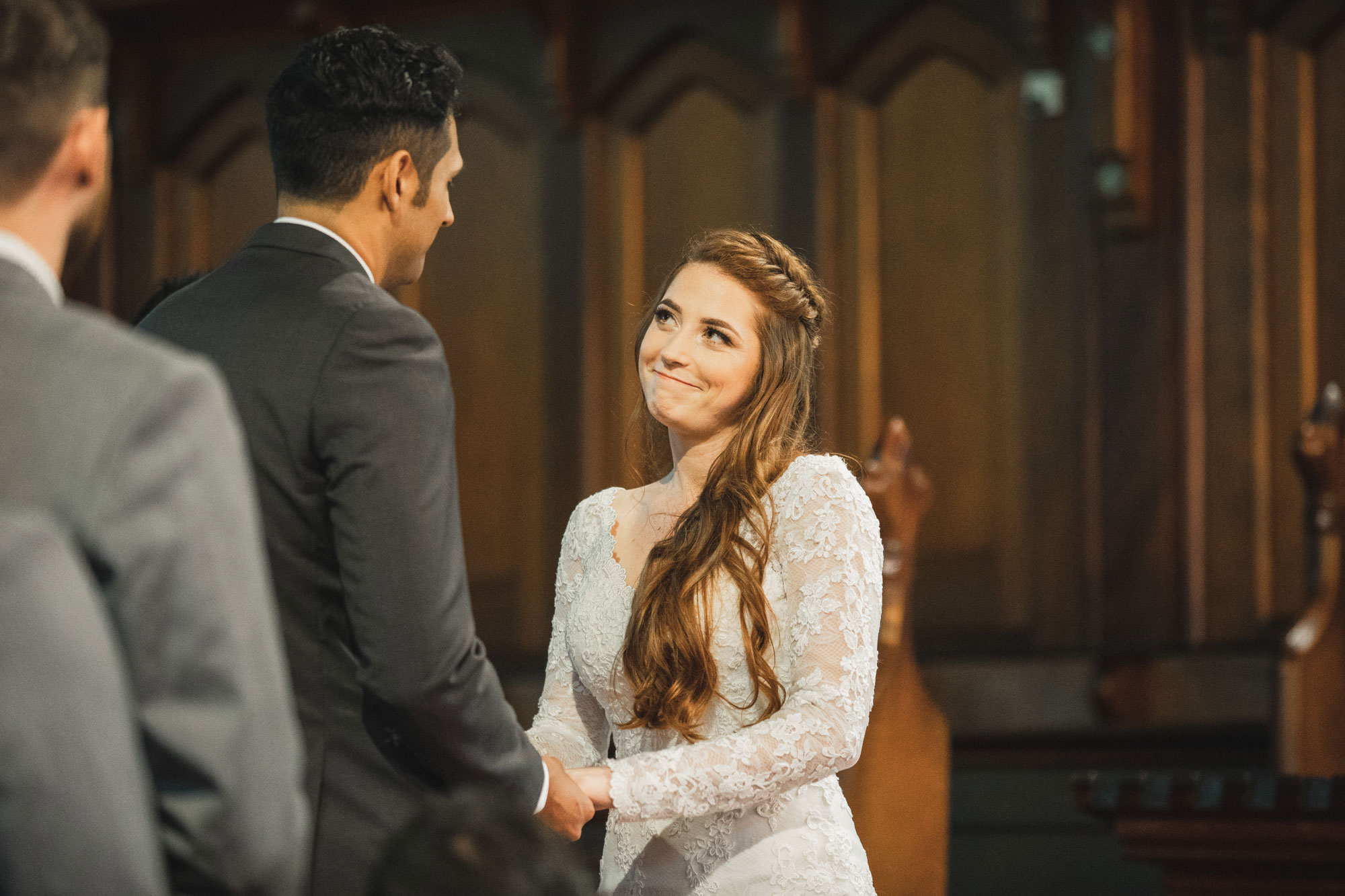 bride smiling at groom