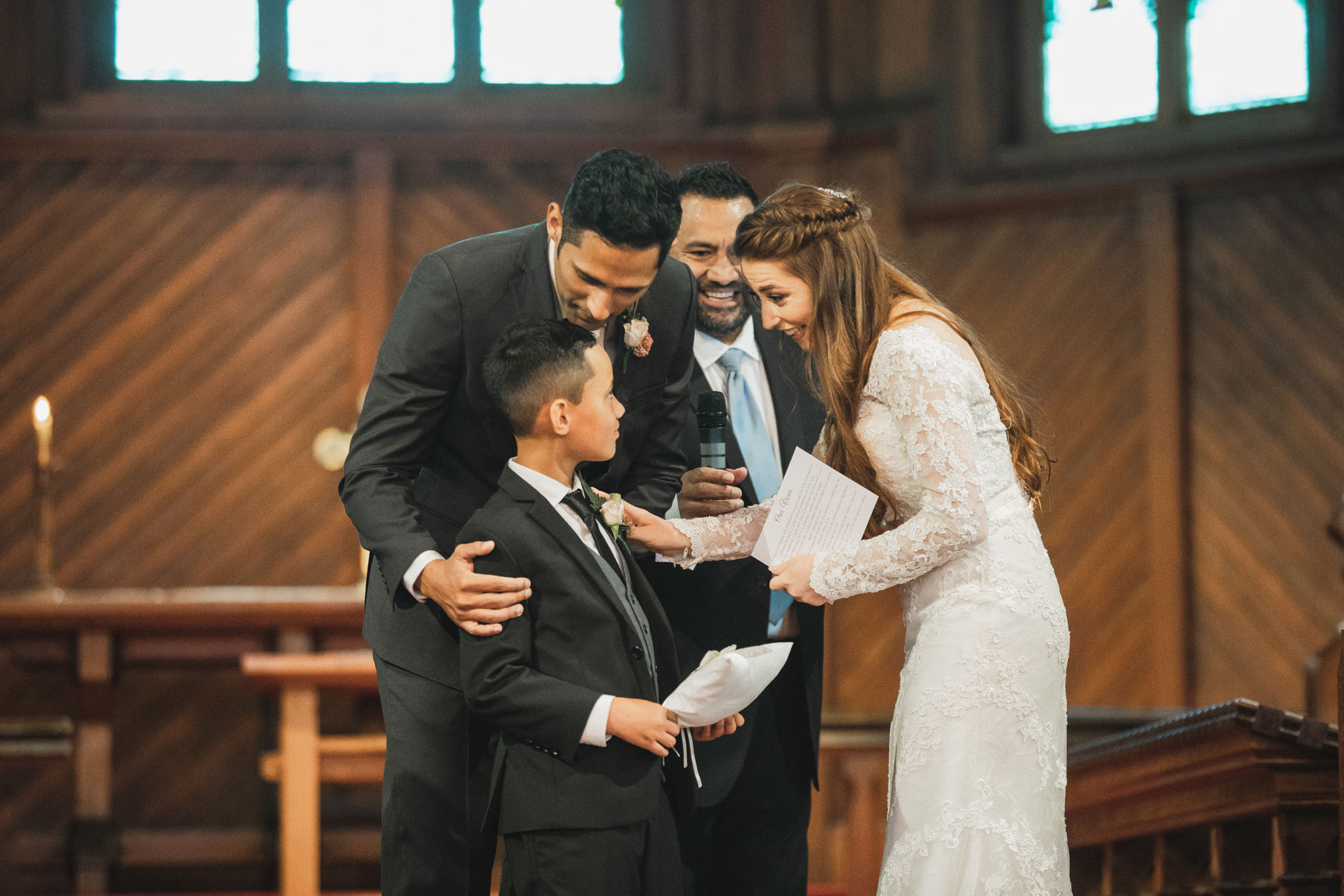 bride and groom and boy