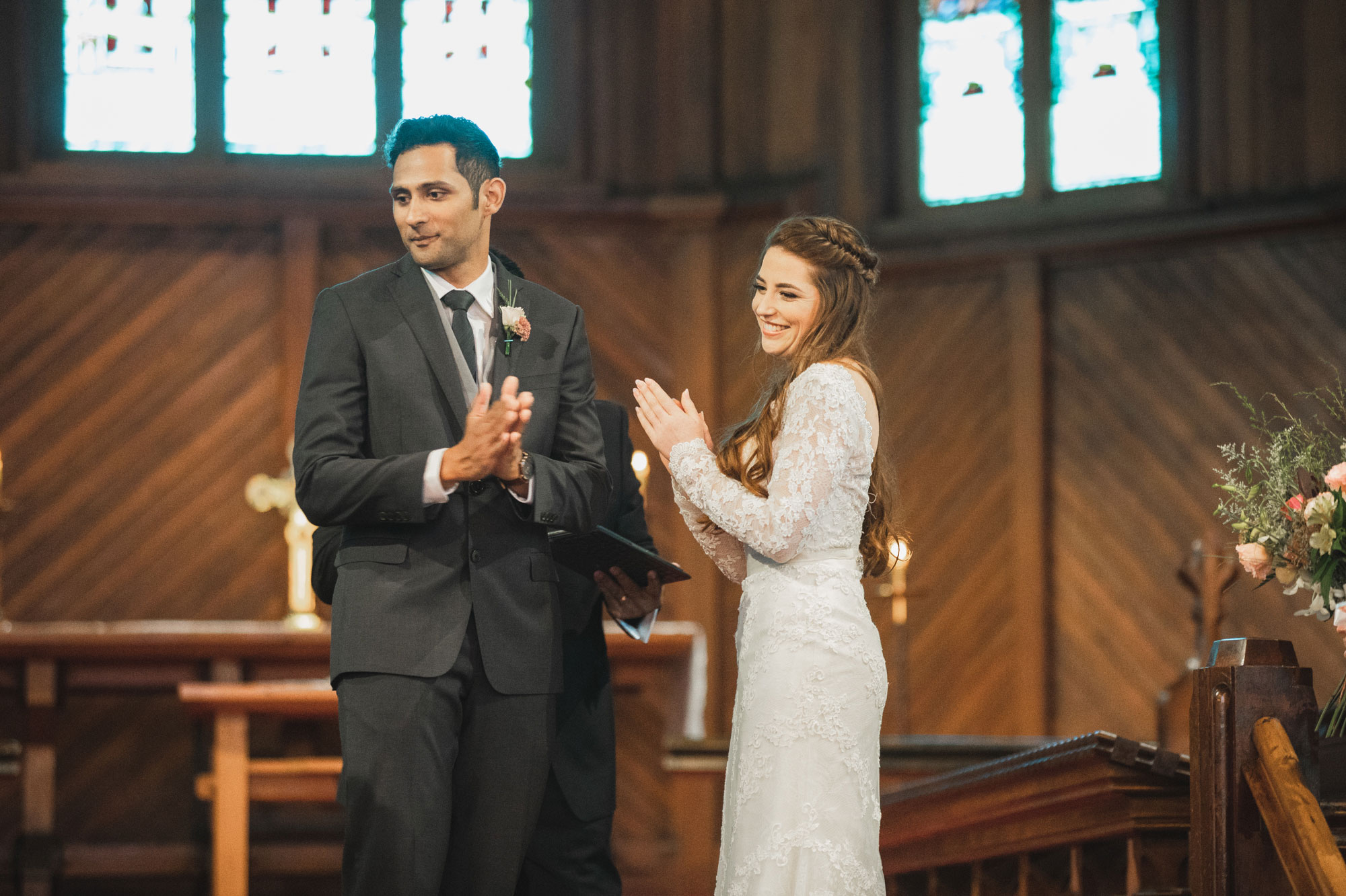 bride and groom clapping