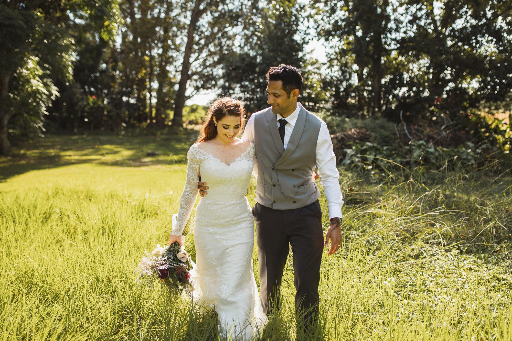 couple photos walking in grass