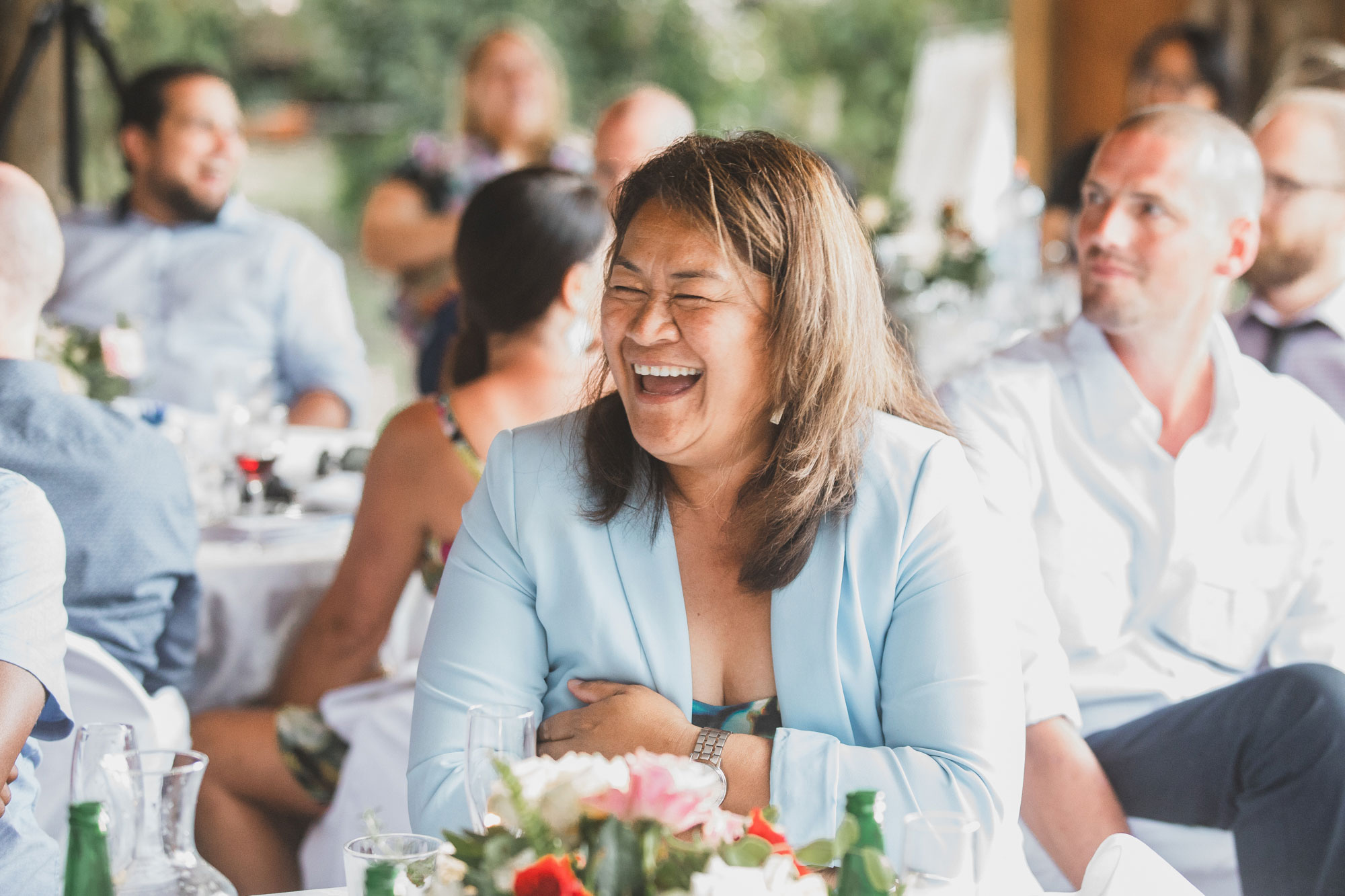 wedding guest laughing