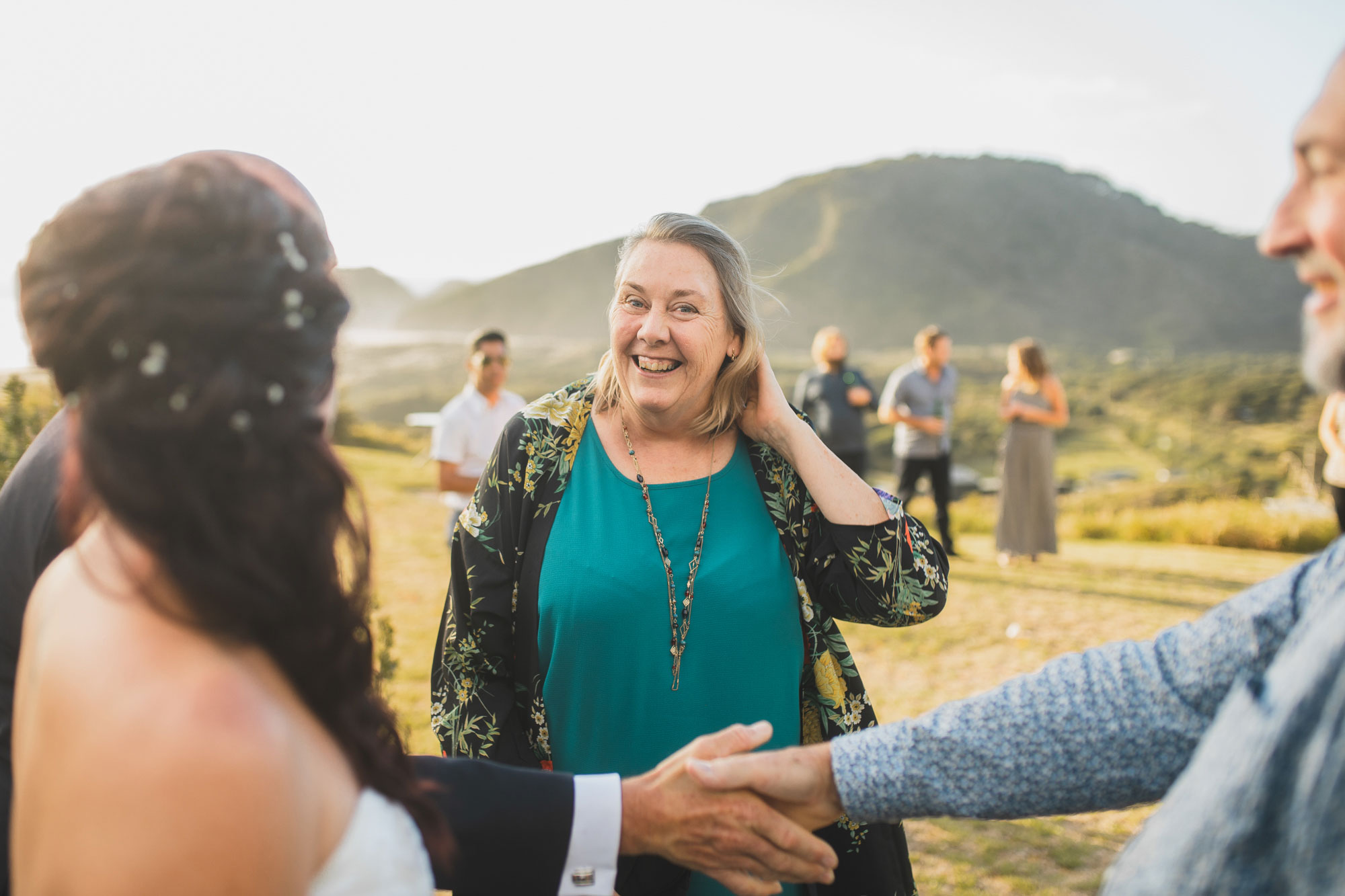 wedding guest smiling at the bride