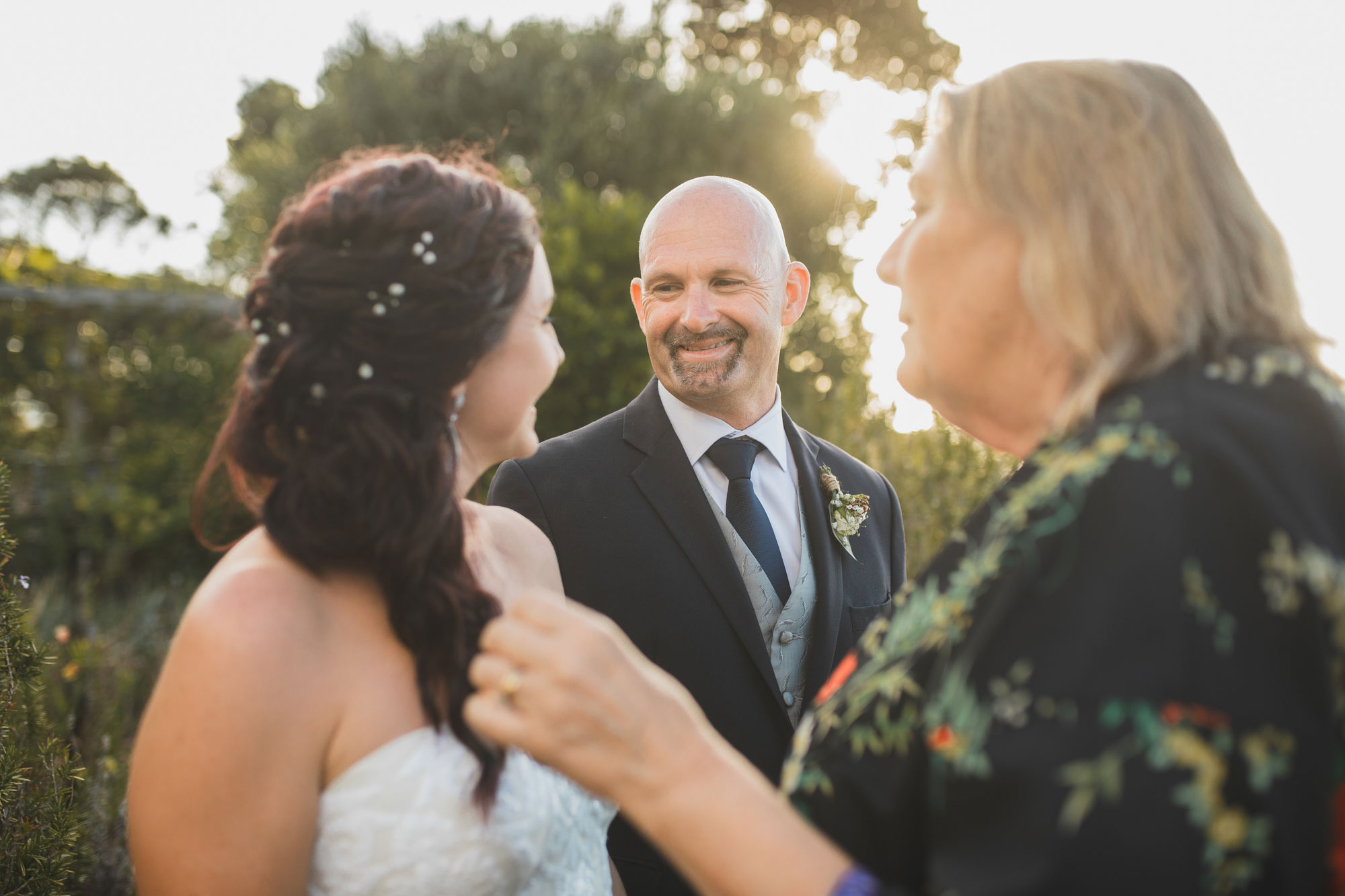 groom smiling at the bride