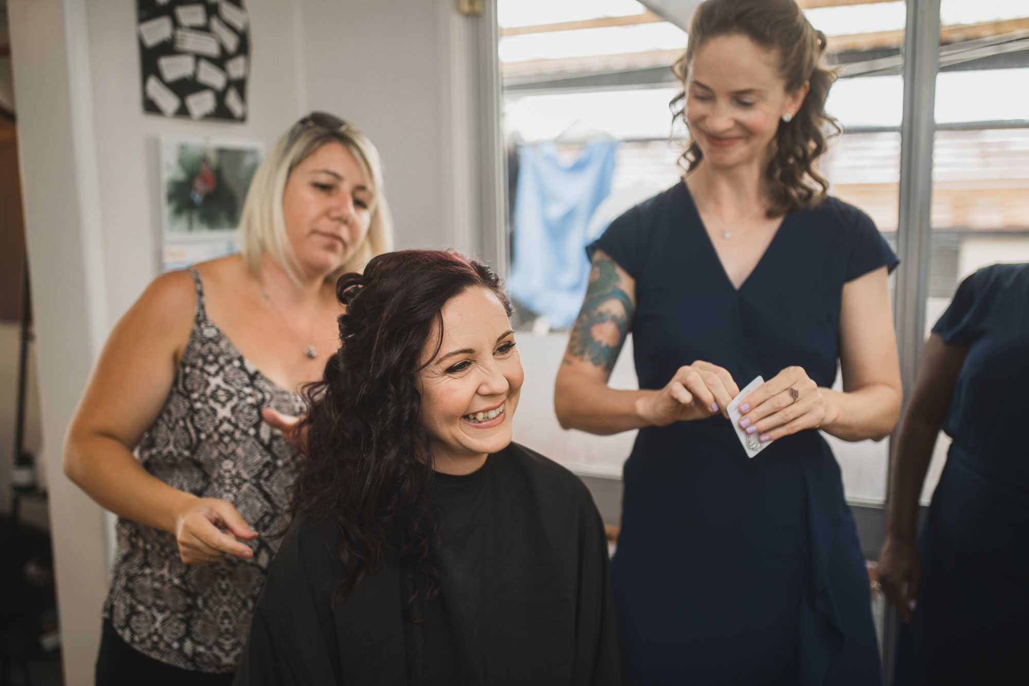 bride getting hair done